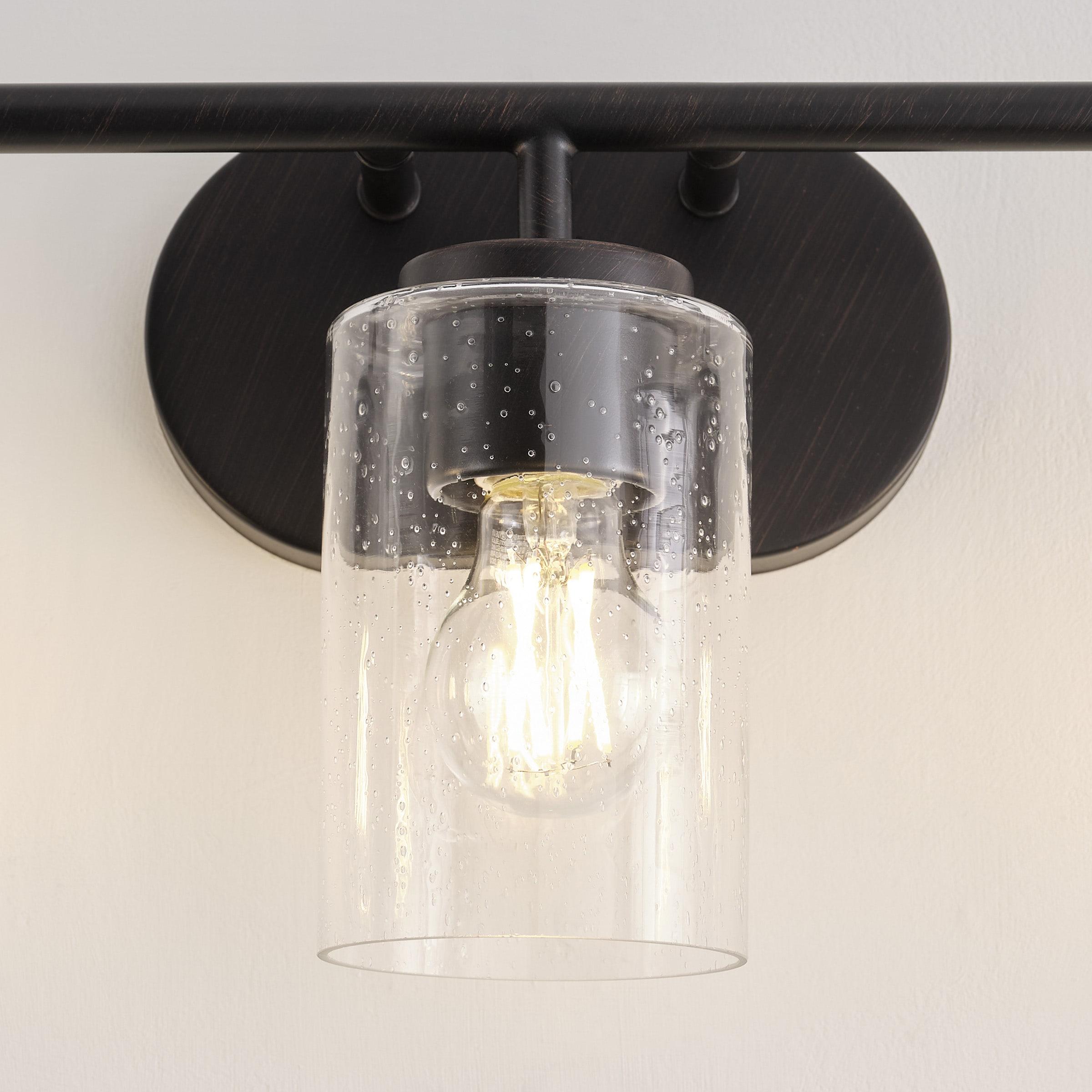 Oslo Bronze 3-Light Vanity Fixture with Clear Seeded Glass