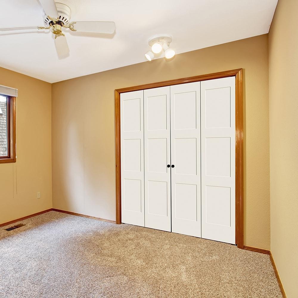 Trimlite Primed 3 Equal Panel Shaker Bi-Fold Door