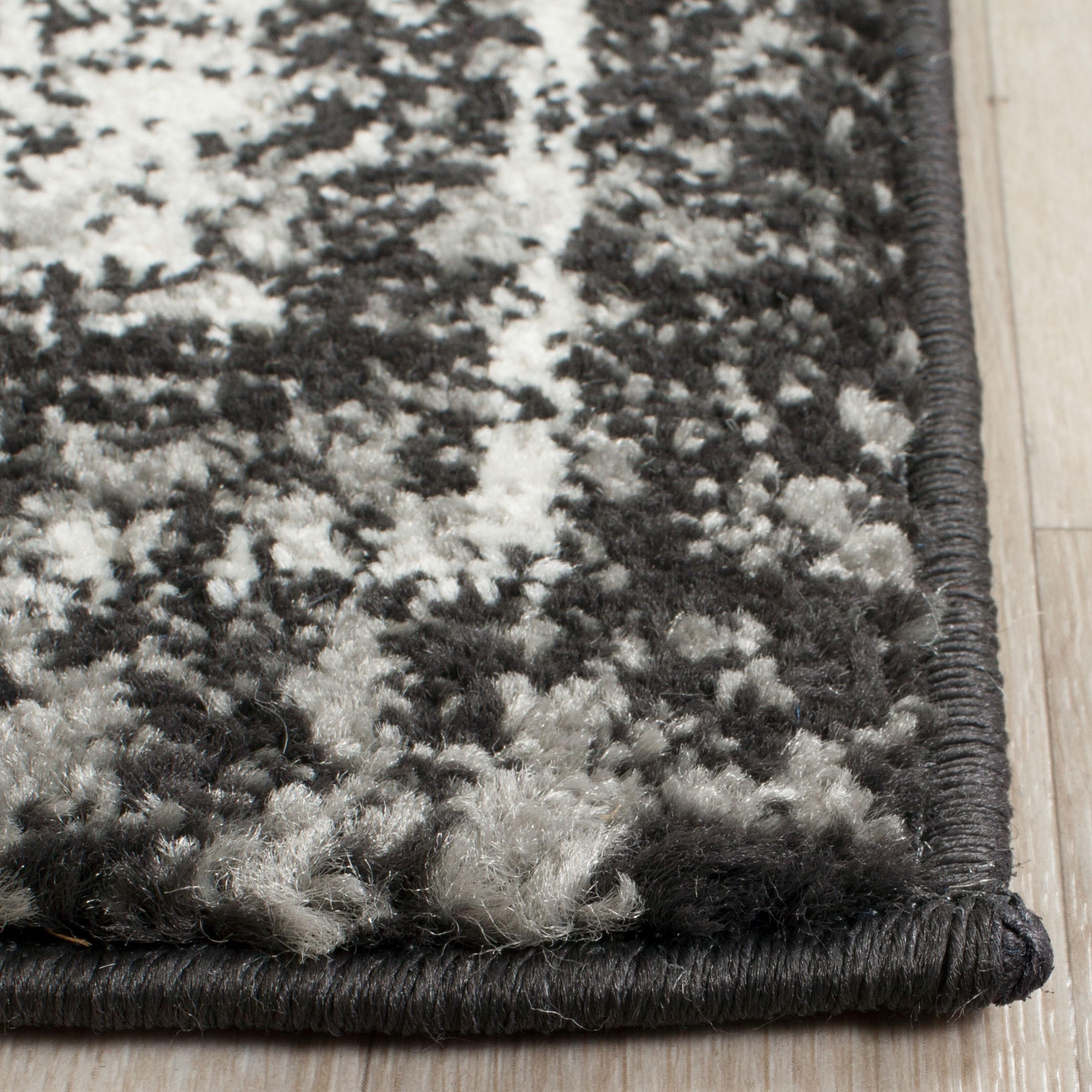 Evoke EVK270 Power Loomed Area Rug Charcoal / Ivory 5'-3" X 7'-6" - Safavieh.