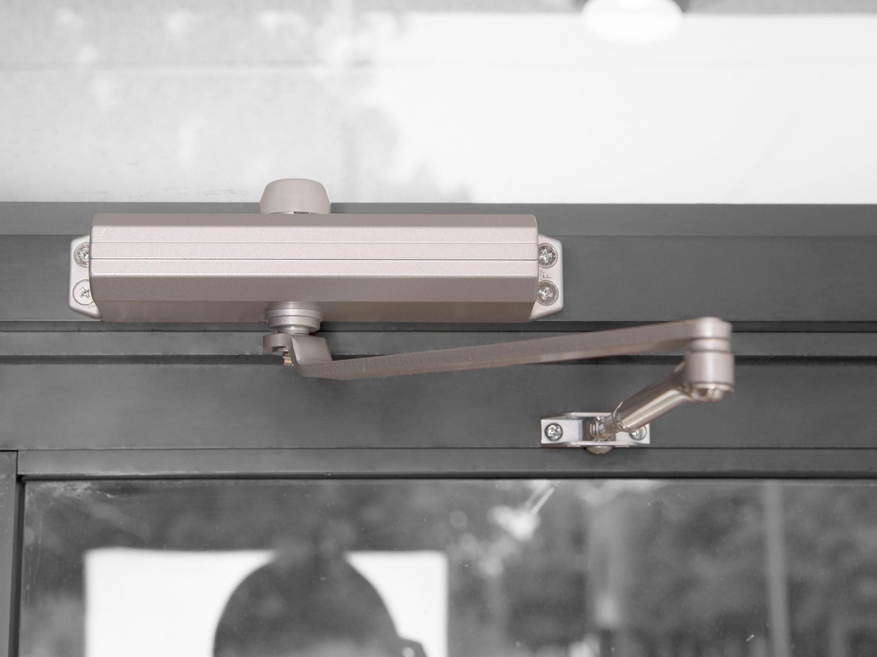 Global Door Controls TC200 Series ADA Closer with Back-Check Size 4 in Aluminum