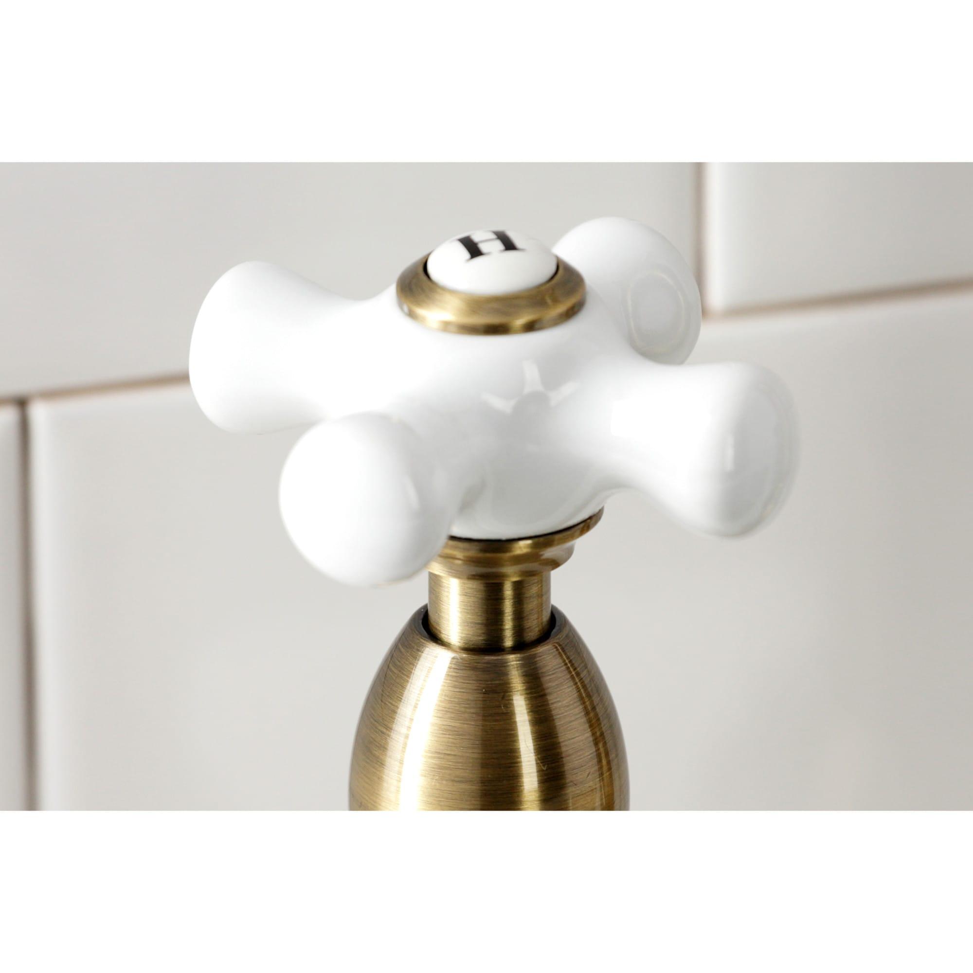 Kingston Brass Heritage Two-Handle 4-Hole Deck Mount Bridge Kitchen Faucet with Brass Side Sprayer