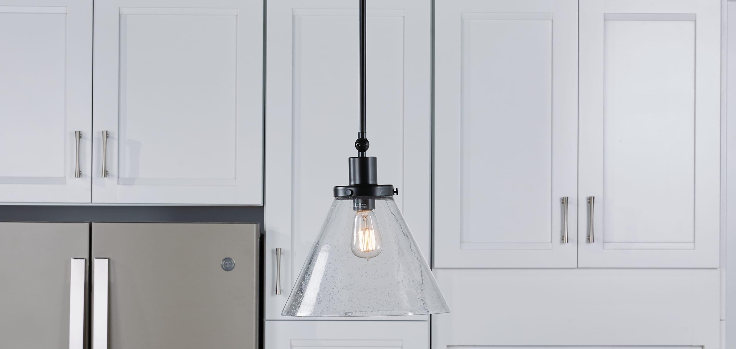 Progress Lighting Hinton 1-Light Industrial Pendant Light, Matte Black, Seeded Glass Shade