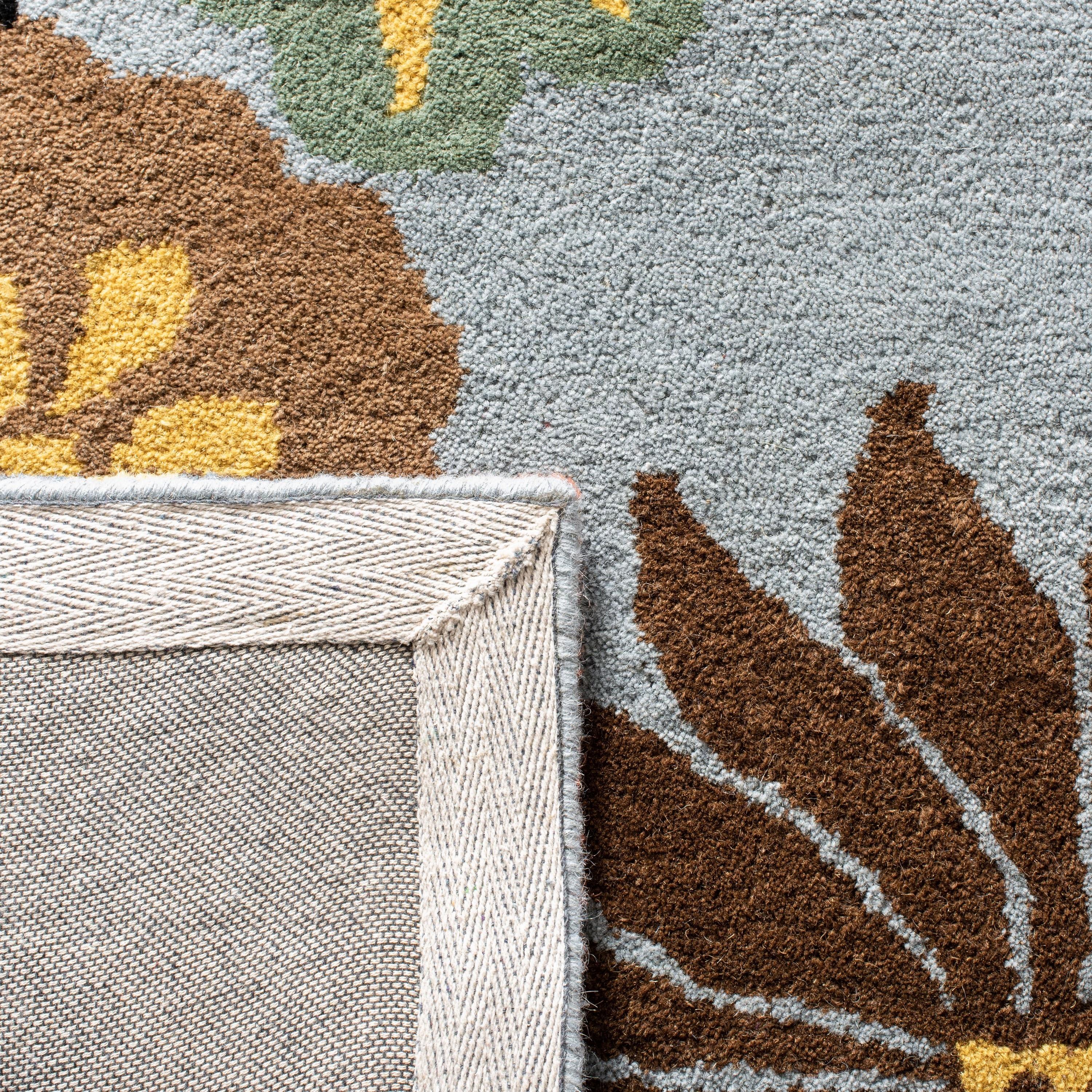 Soho SOH738 Hand Tufted Area Rug - Blue/Multi - 8'3"x11' - Safavieh.