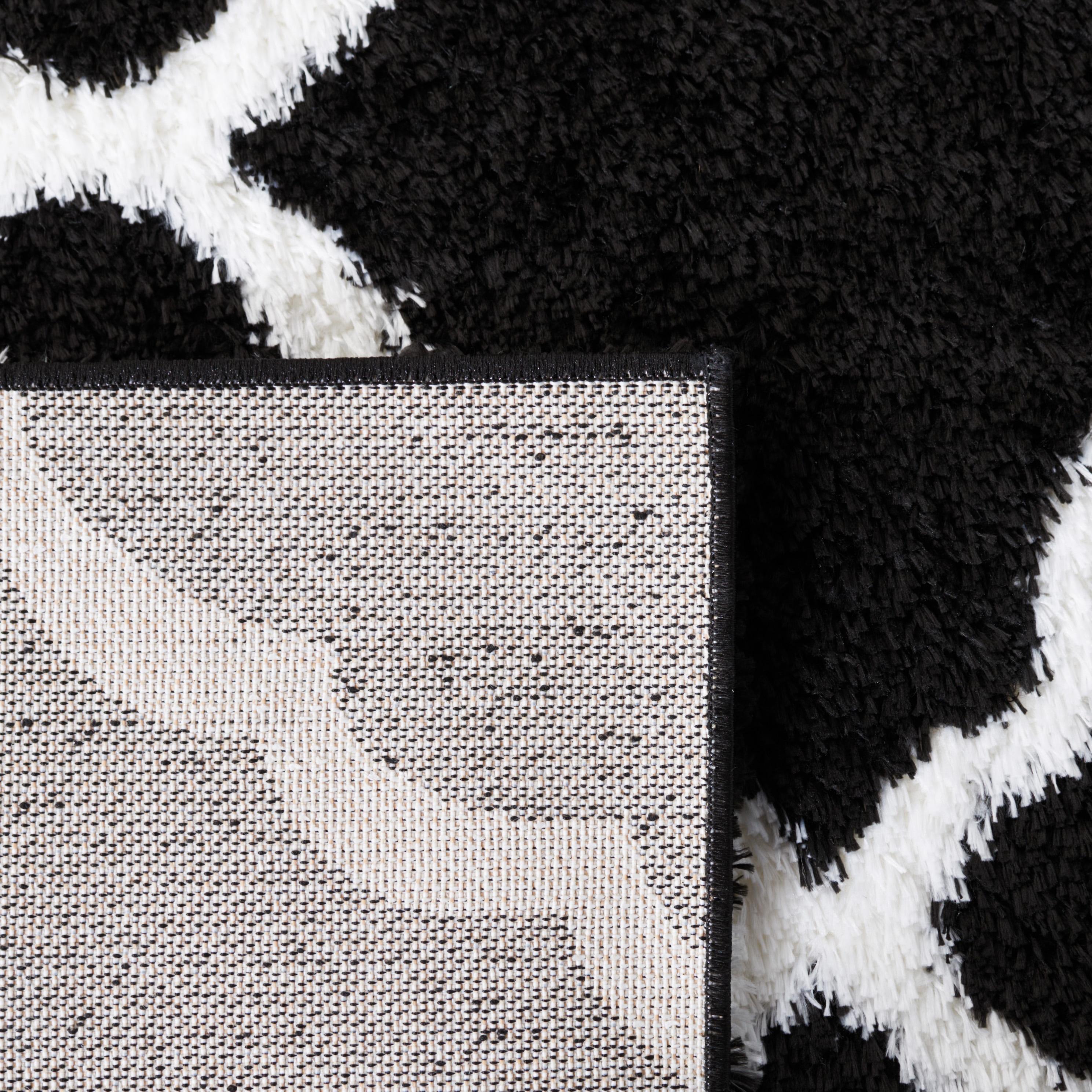 Tahoe Shag THO675 Power Loomed Area Rug - Black/White - 6'7"x8'7" - Safavieh.