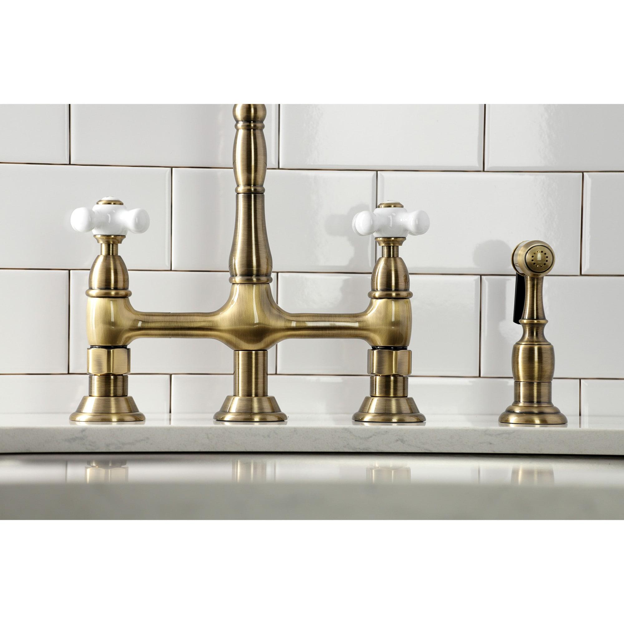 Kingston Brass Heritage Two-Handle 4-Hole Deck Mount Bridge Kitchen Faucet with Brass Side Sprayer