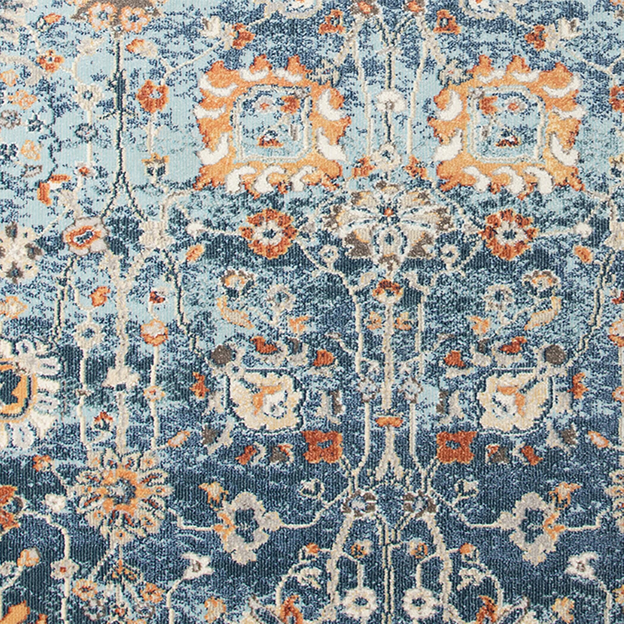 Bohemian Blue and Beige Synthetic 5' x 7' Area Rug