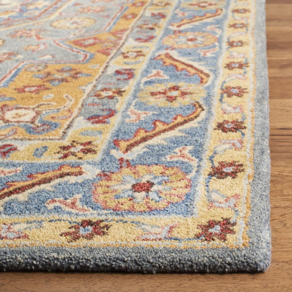 Antiquity AT504 Hand Tufted Area Rug - Blue/Gold - 6'x9' - Safavieh.