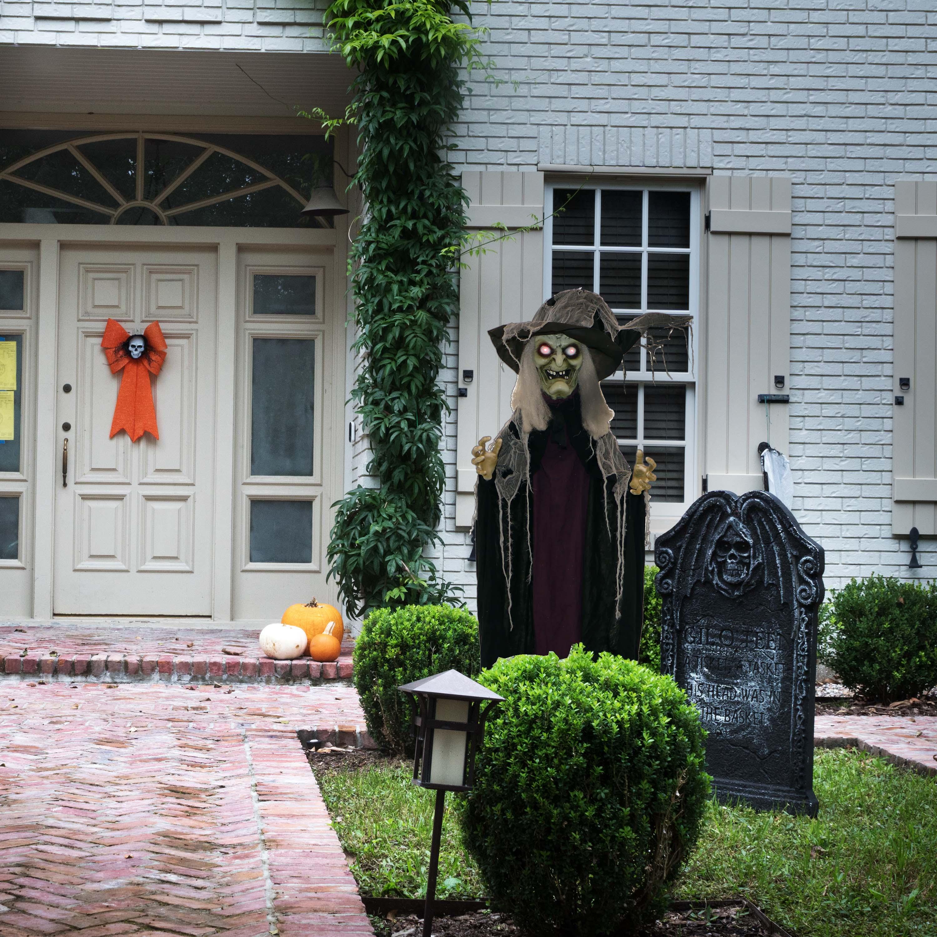 c&g home Life-Size Poseable Witch with Lights and Sound, Indoor/Covered Outdoor Halloween Decoration