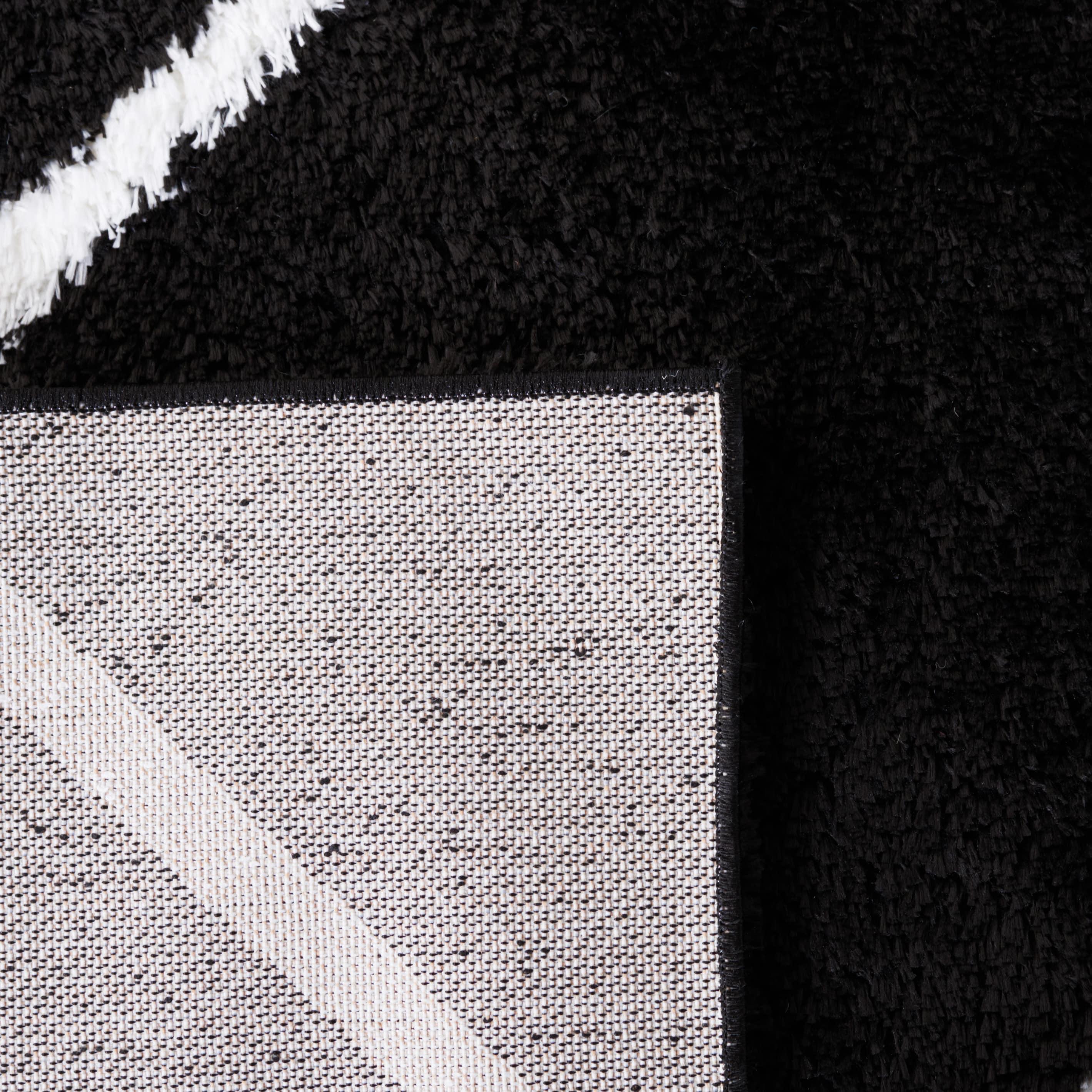 Tahoe Shag THO676 Power Loomed Indoor Area Rug - Black/White - 6'7"x8'7" - Safavieh