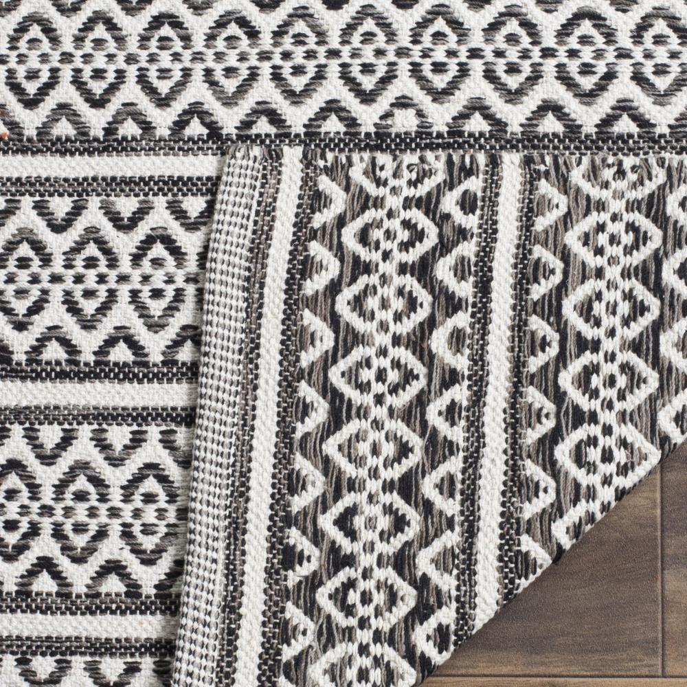 Montauk MTK341 Hand Woven Area Rug - Ivory/Black - 8'9"x11'9" - Safavieh.