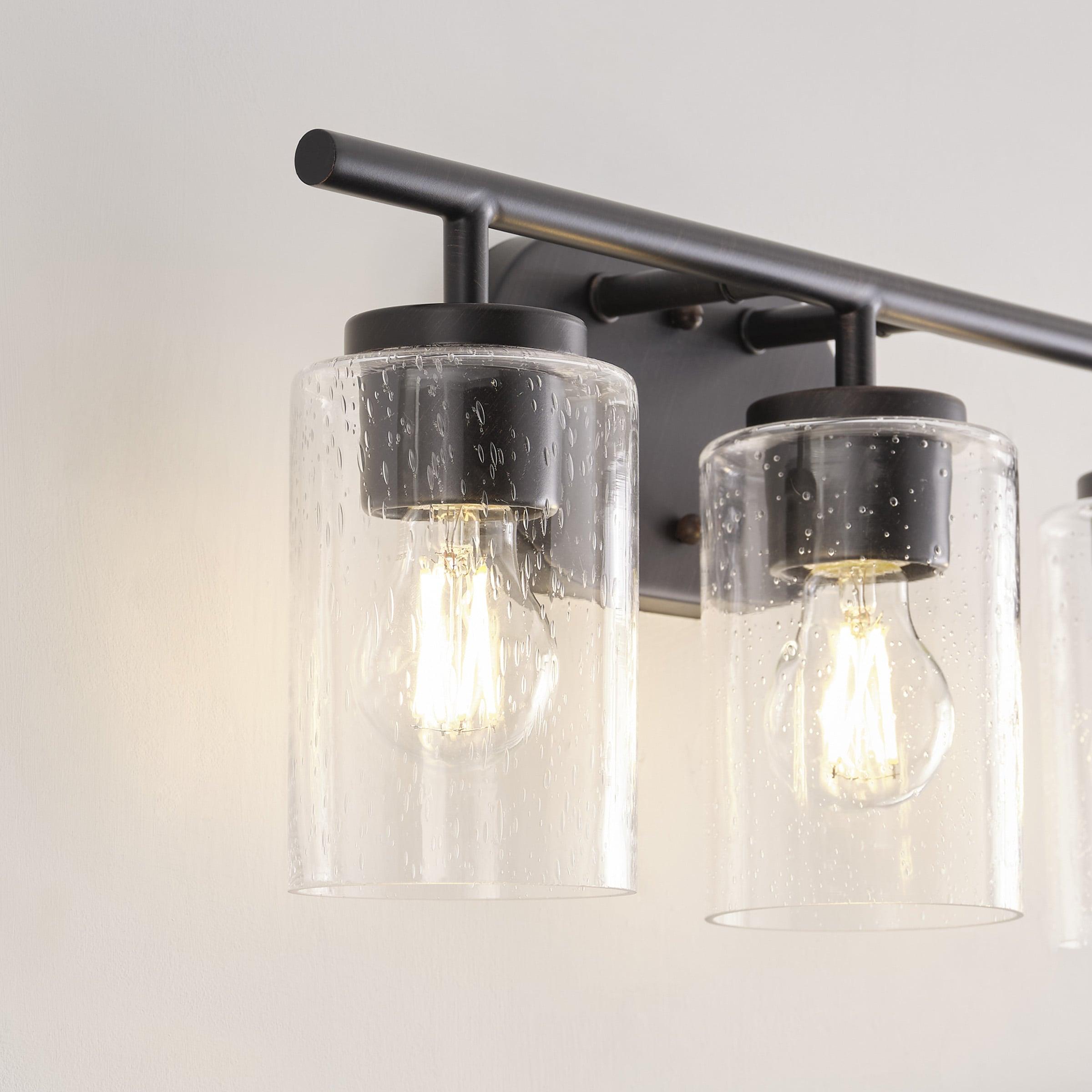 Oslo Bronze 3-Light Vanity Fixture with Clear Seeded Glass