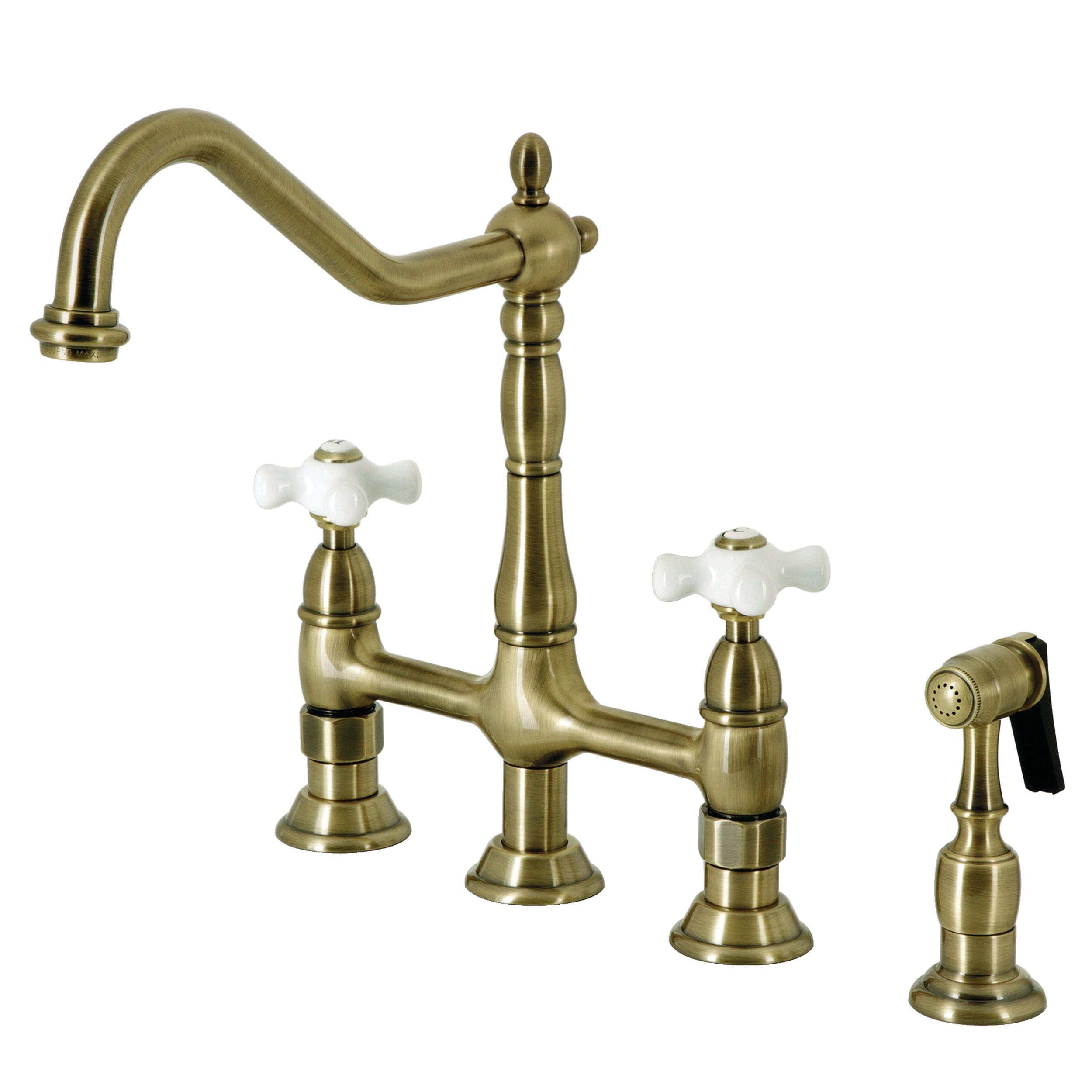 Kingston Brass Heritage Two-Handle 4-Hole Deck Mount Bridge Kitchen Faucet with Brass Side Sprayer