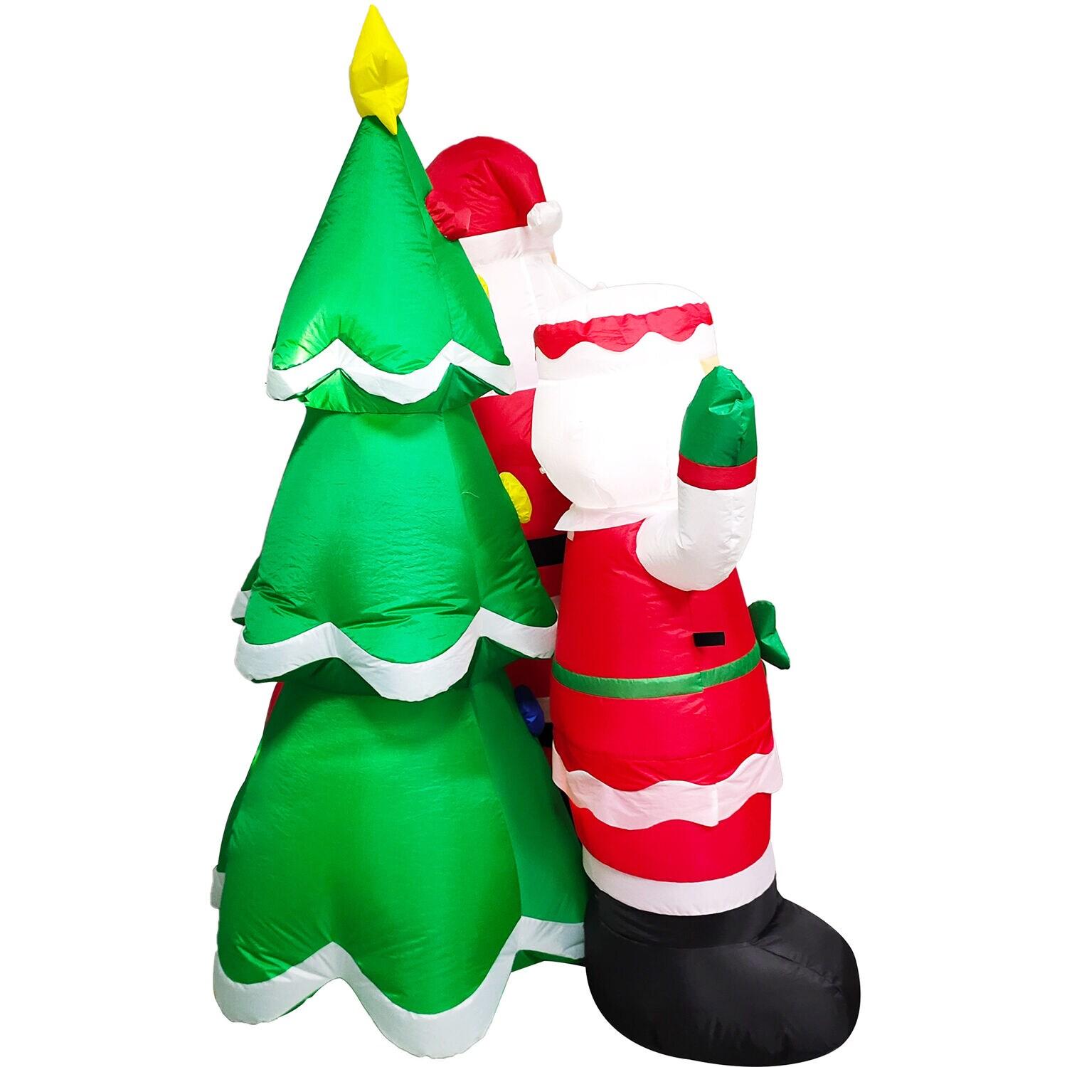 Fraser Hill Farm 6-Ft. Tall Prelit Mr. and Mrs. Claus with Tree Inflatable with Music