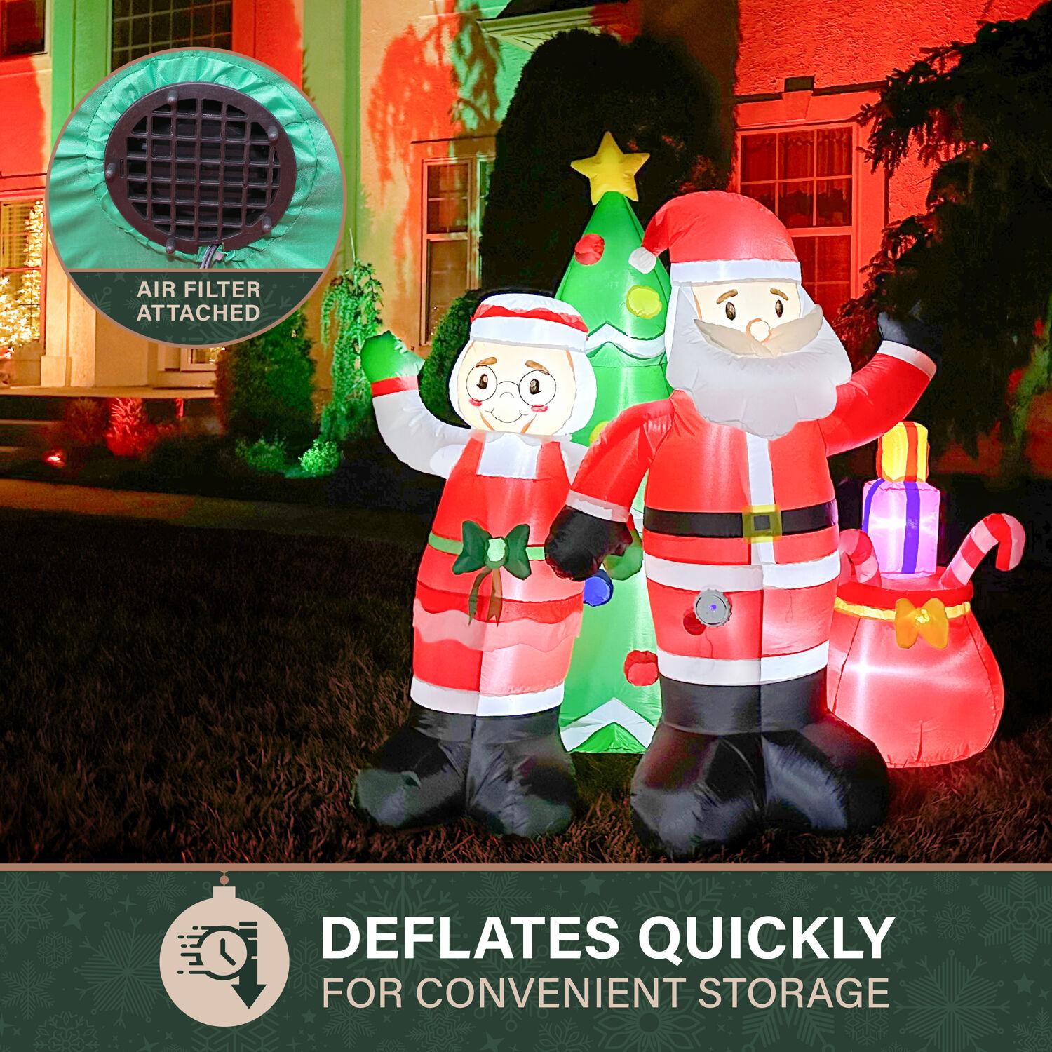 Fraser Hill Farm 6-Ft. Tall Prelit Mr. and Mrs. Claus with Tree Inflatable with Music