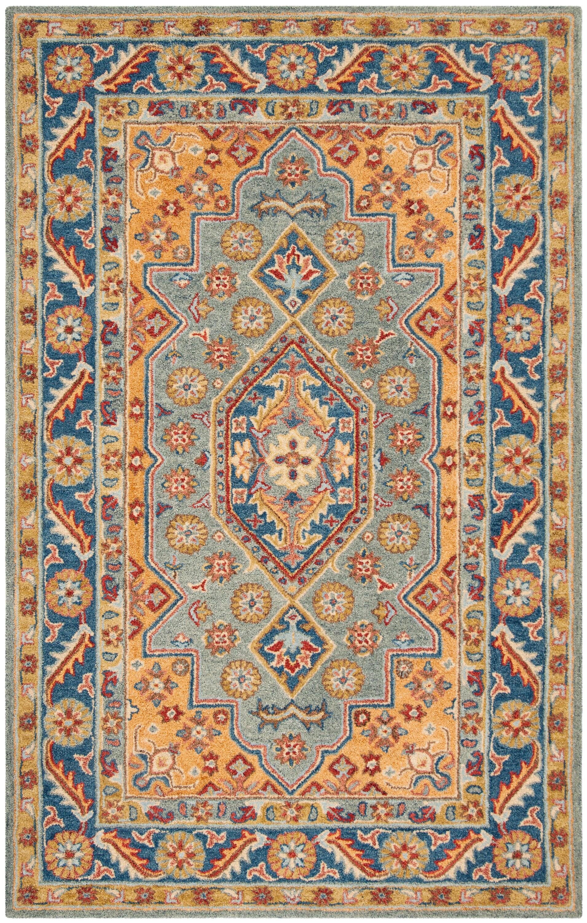 Antiquity AT504 Hand Tufted Area Rug - Blue/Gold - 5'x8' - Safavieh.