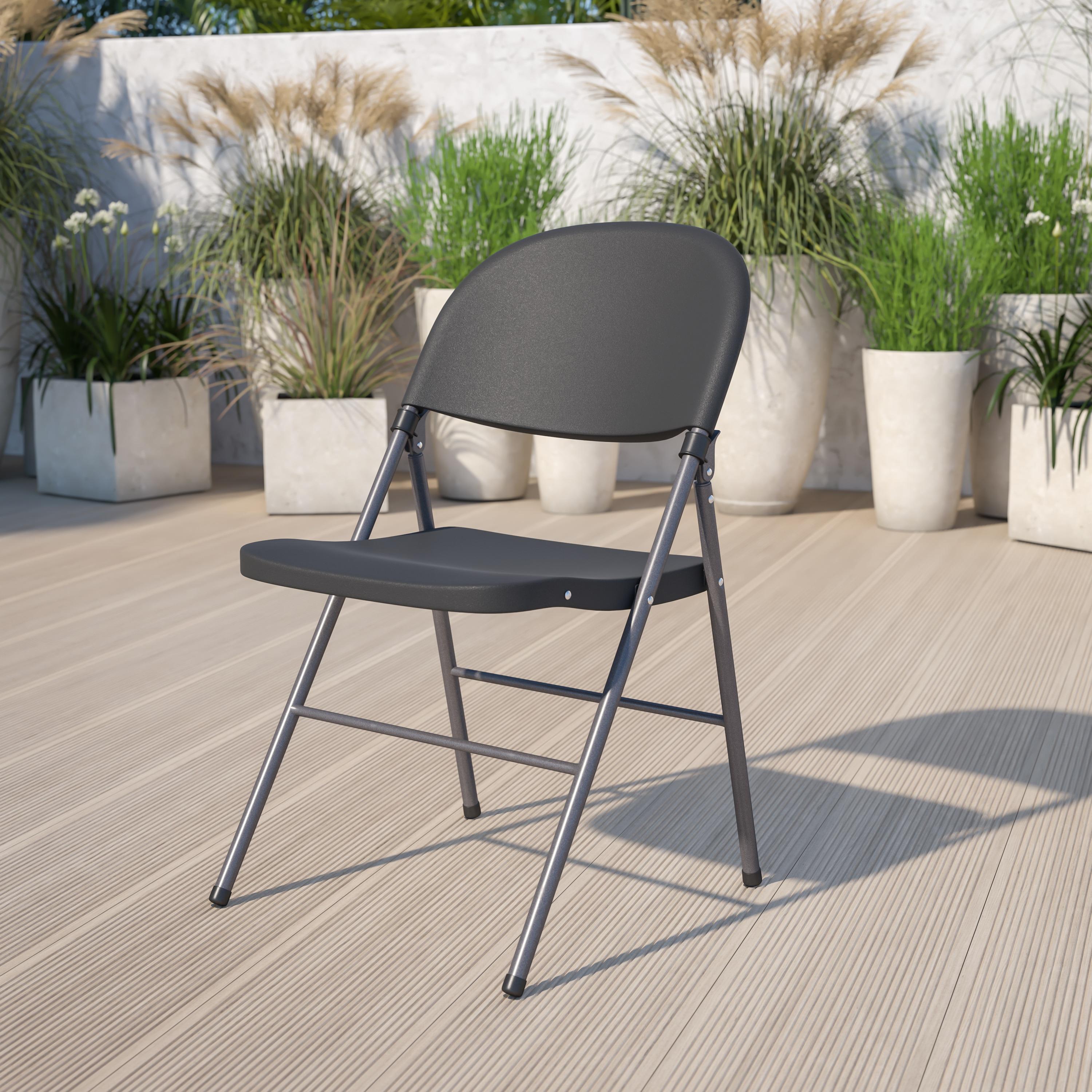 Flash Furniture HERCULES Series 330 lb. Capacity Black Plastic Folding Chair with Charcoal Frame