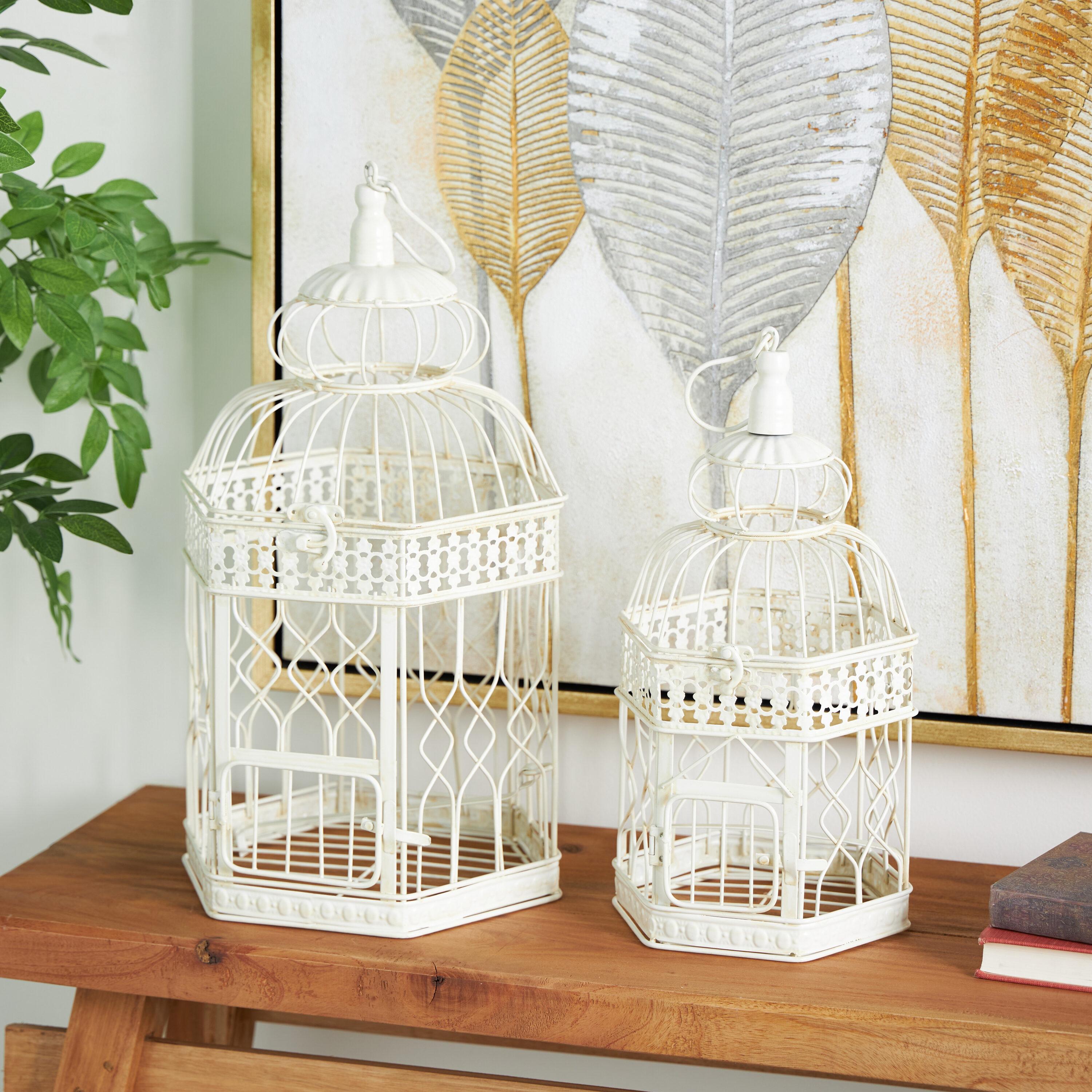 DecMode Cream Vintage Metal Birdcage with Crisscross Vertical Bars and Floral Embossed Design, Set of 2 21", 18"H