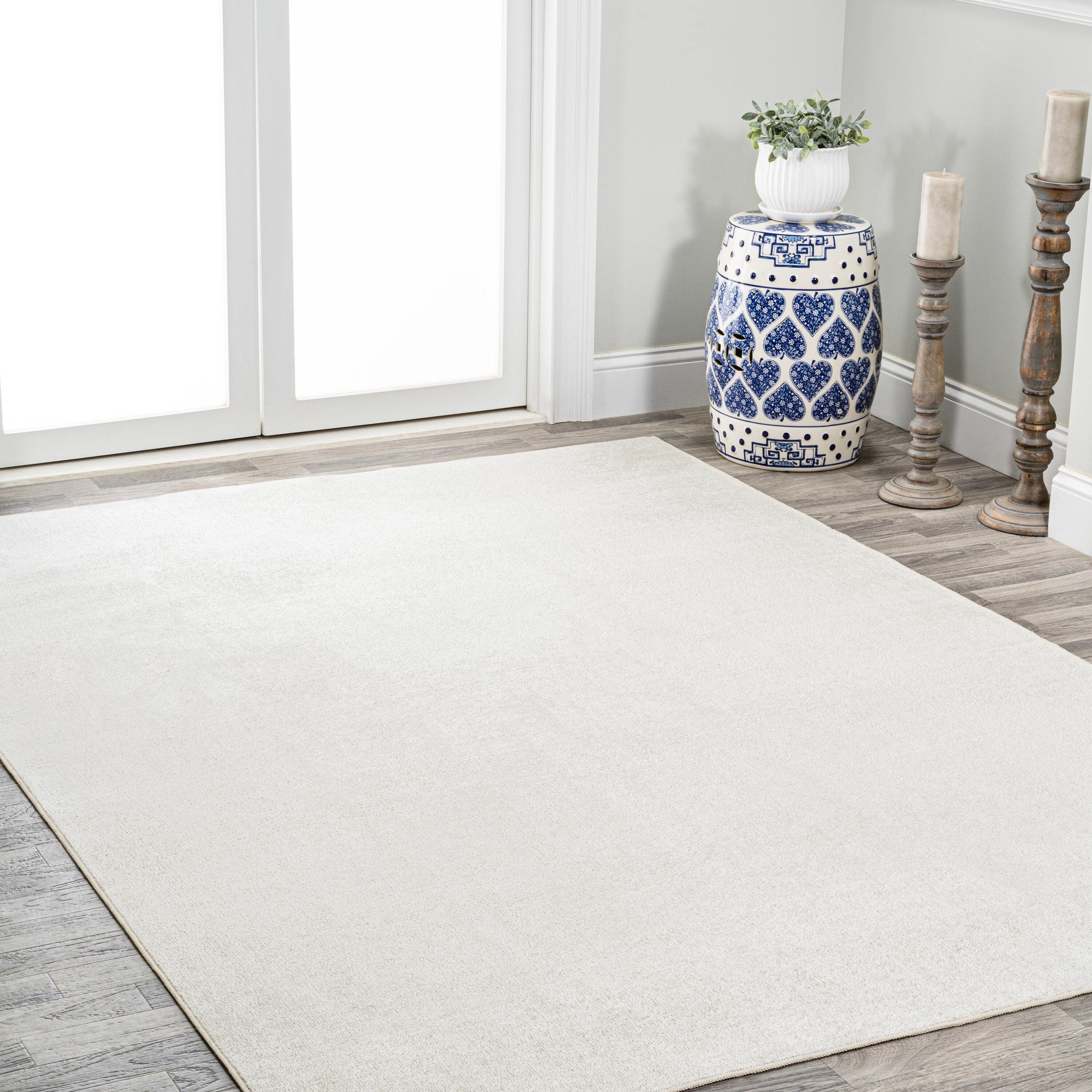 JONATHAN Y Twyla Classic Solid Low-Pile Machine-Washable Cream 4 ft. x 6 ft. Area Rug