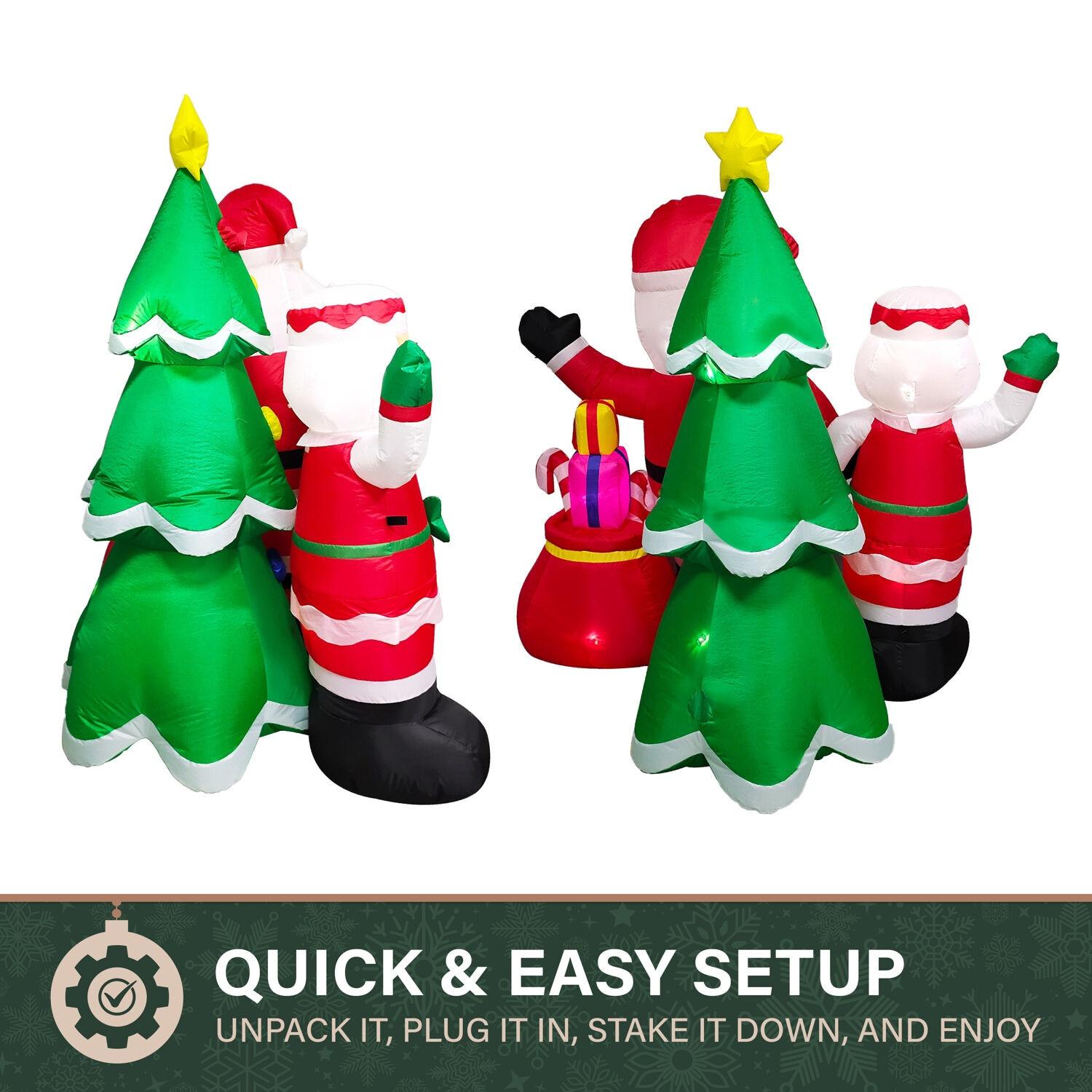 Fraser Hill Farm 6-Ft. Tall Prelit Mr. and Mrs. Claus with Tree Inflatable with Music