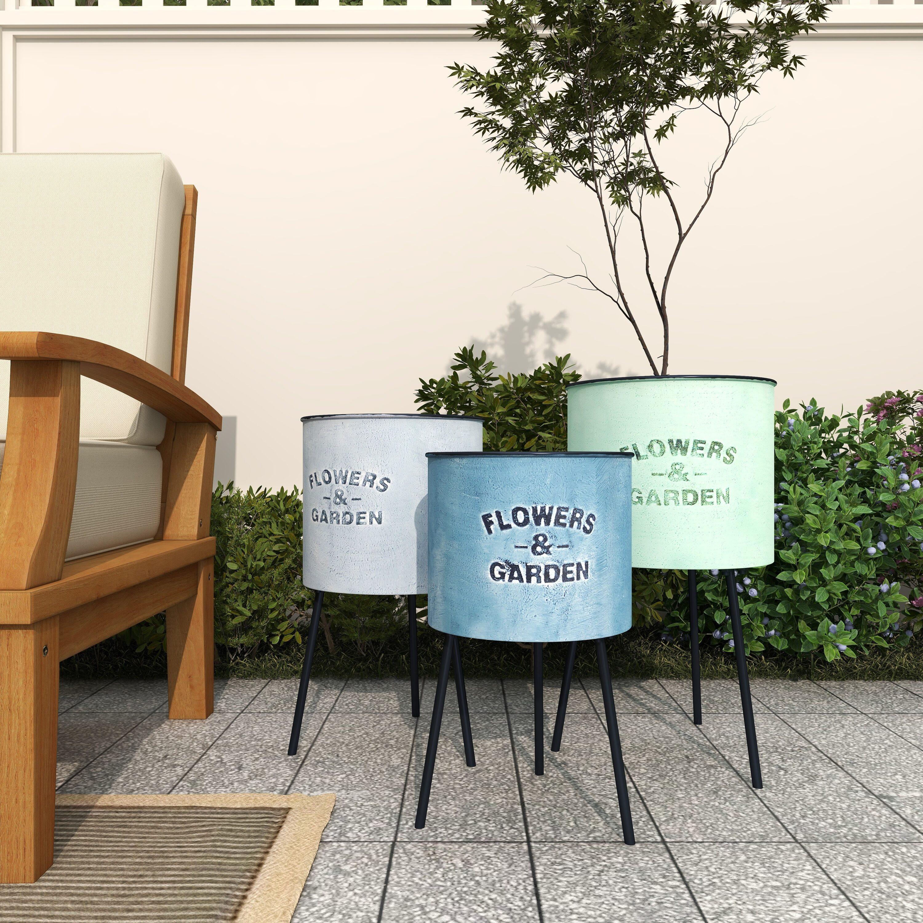 DecMode 20", 18", 16"H Indoor Outdoor Multi Colored Metal Planter with Flowers And Garden Text (3 Count)