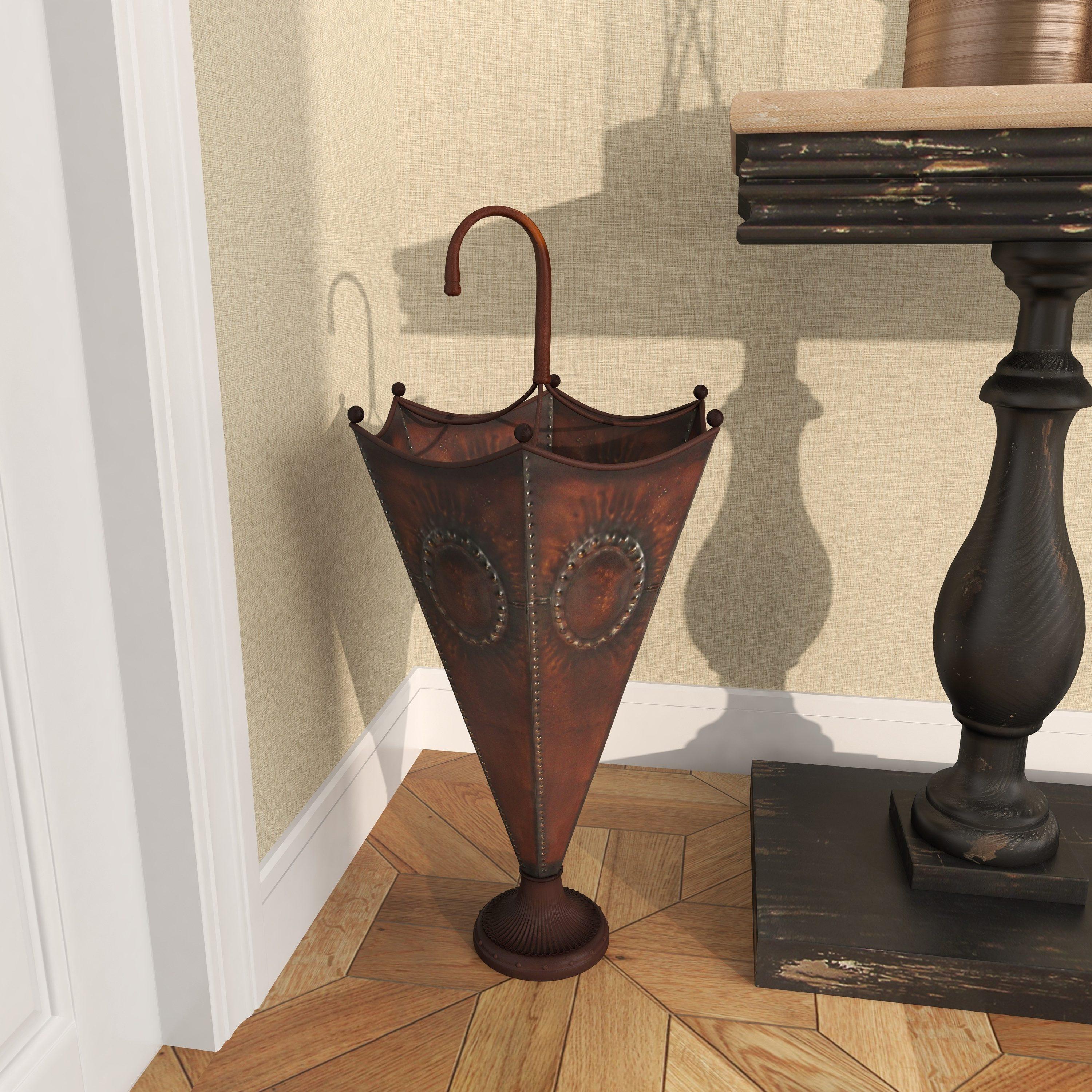 DecMode Brown Metal Umbrella Stand with Embossed Emblems