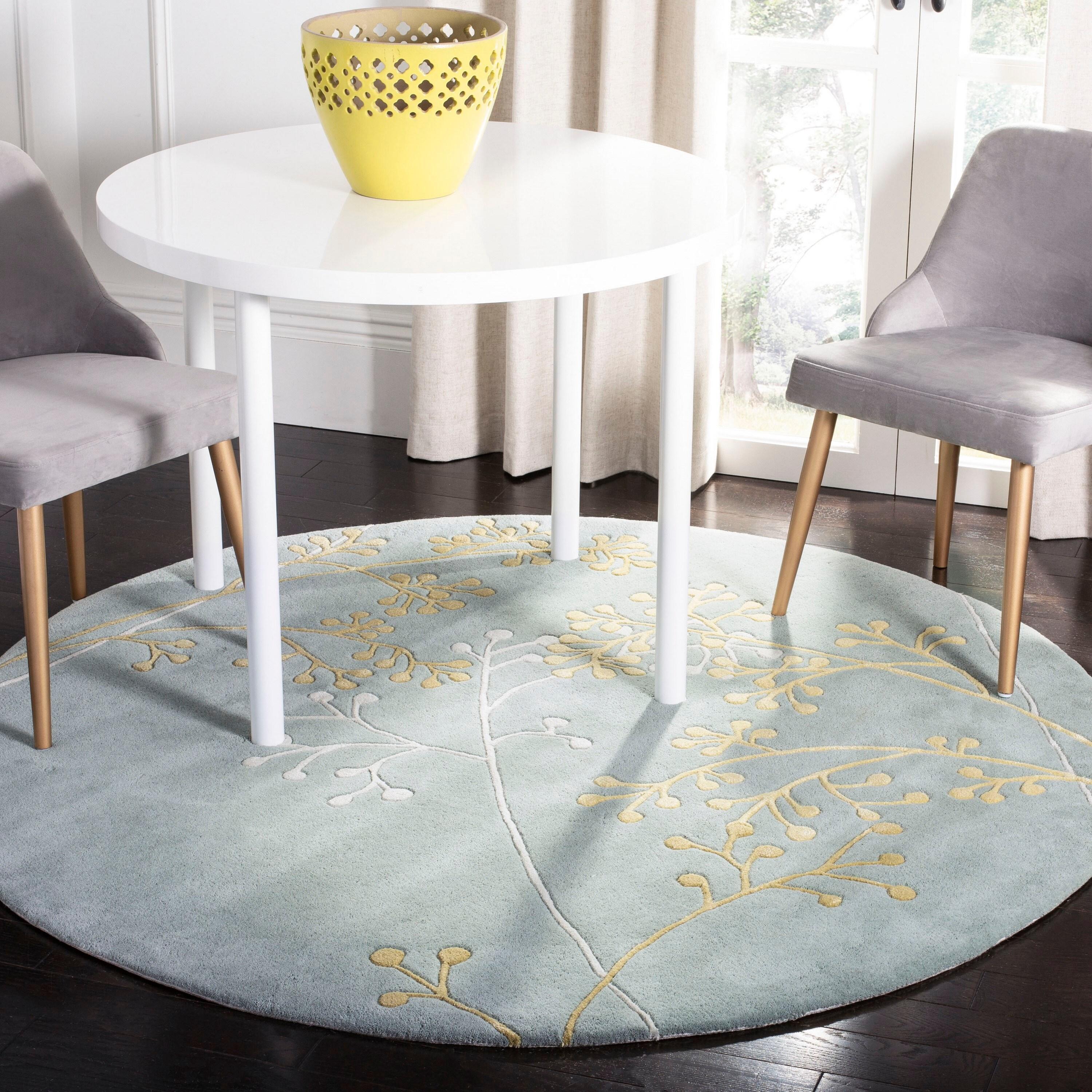 Soho SOH305 Hand Tufted Area Rug - Light Blue - 8' round - Safavieh.