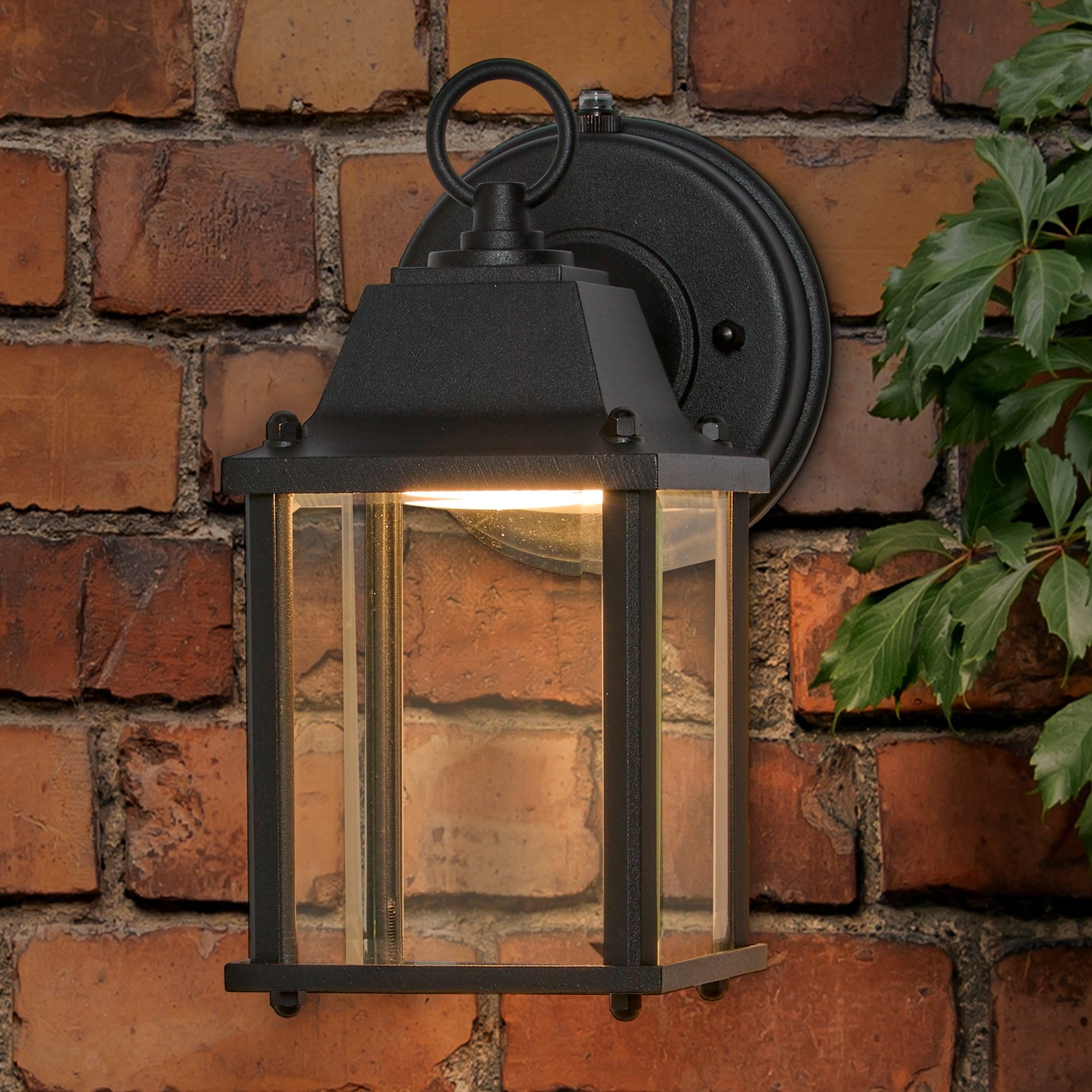 Elegant Black Aluminum Lantern-Style Sconce with Clear Glass and Dusk-to-Dawn Sensor