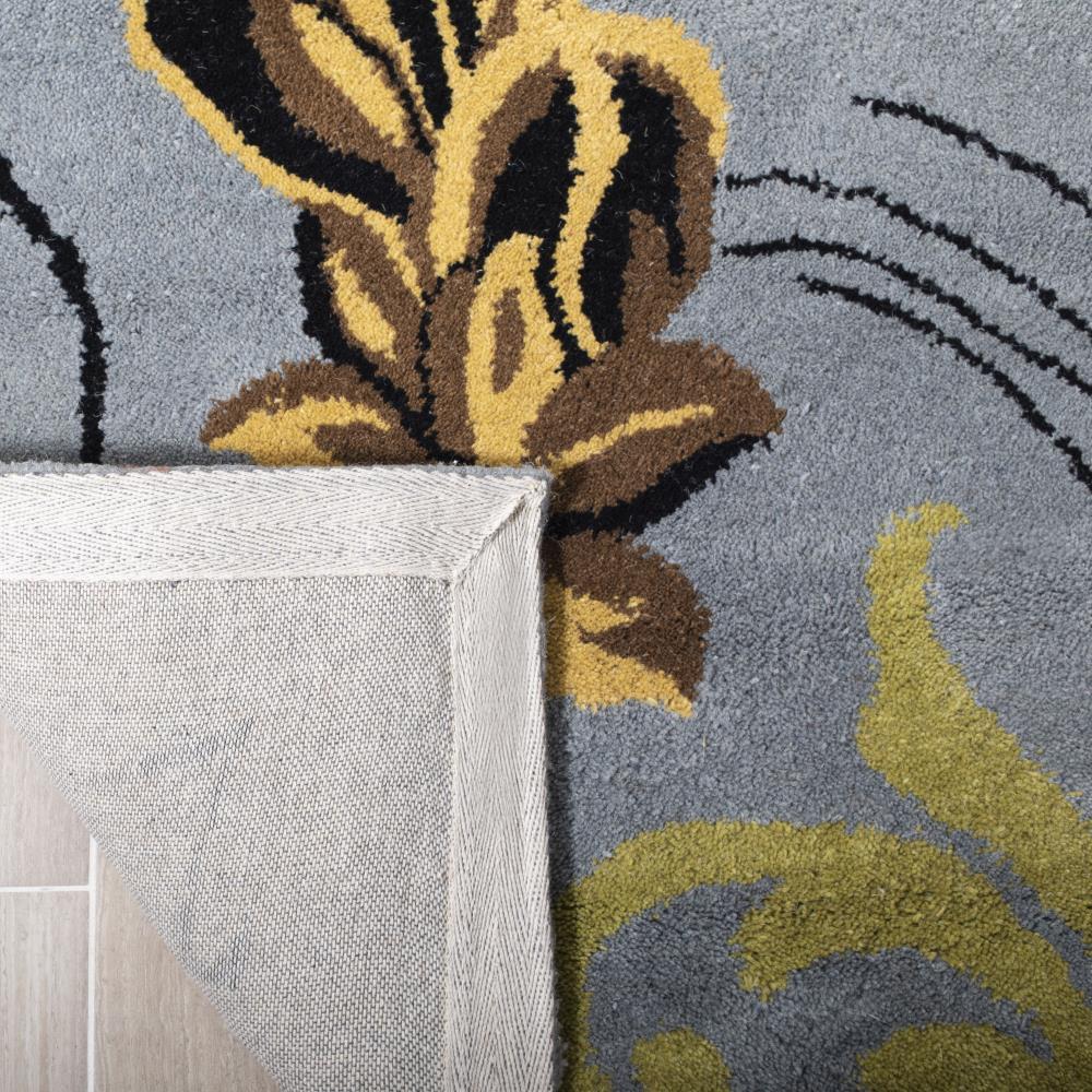 Soho SOH736 Hand Tufted Rectangle Contemporary Area Rug - Blue - 5' X 8' - Safavieh.