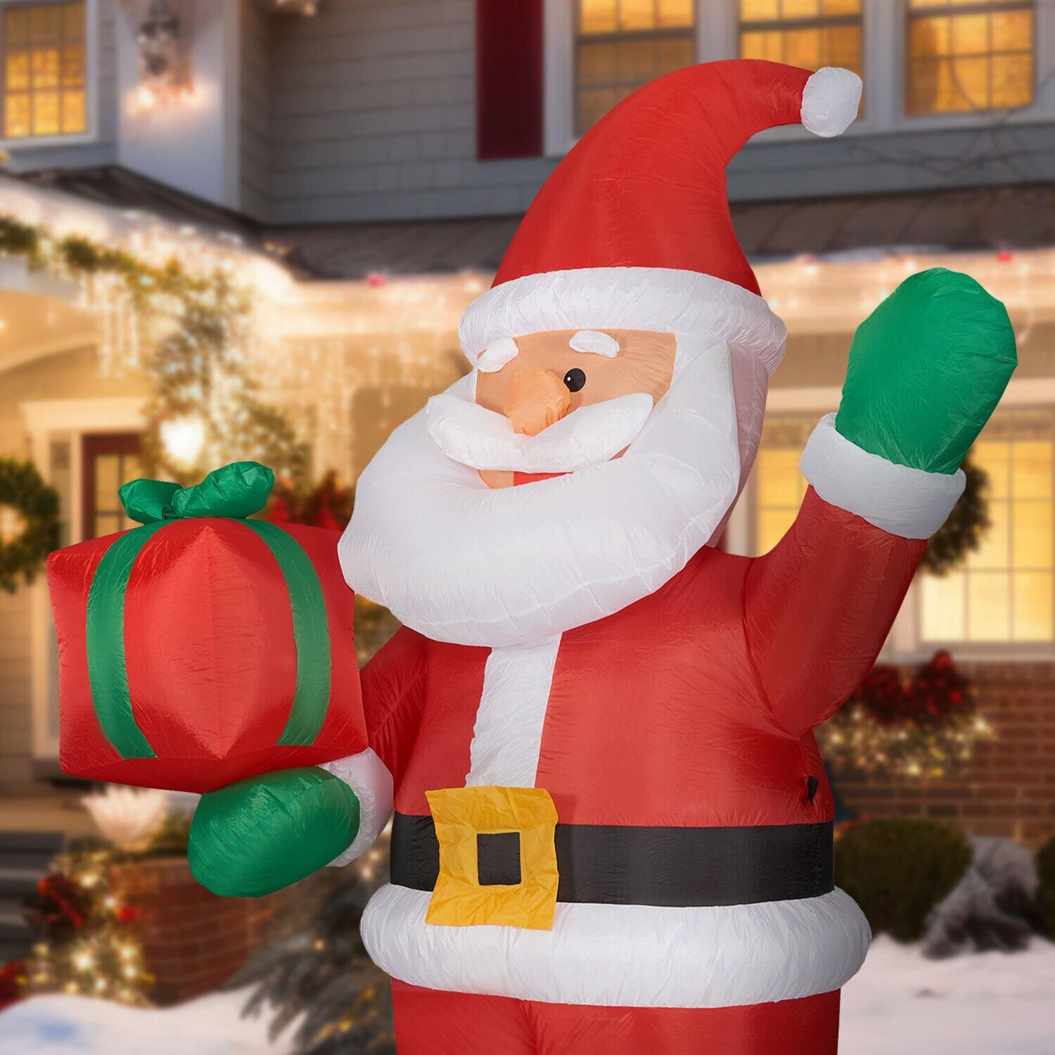 Fraser Hill Farm 10-Ft. Tall Pre-Lit Christmas Inflatable | Santa Claus Holding Gift with Lights and Storage Bag | Outdoor Holiday Blow-Up Festive Celebration Party Decor | FHFSANTA102-L