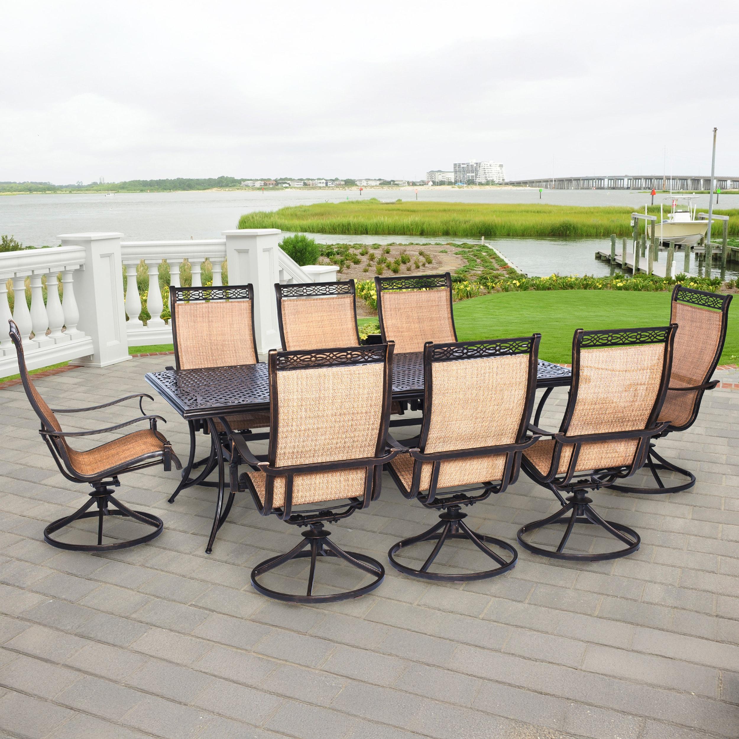 Hanover Outdoor Manor 9-Piece Outdoor Dining Set with 8 Swivel Rockers, Cedar/Bronze