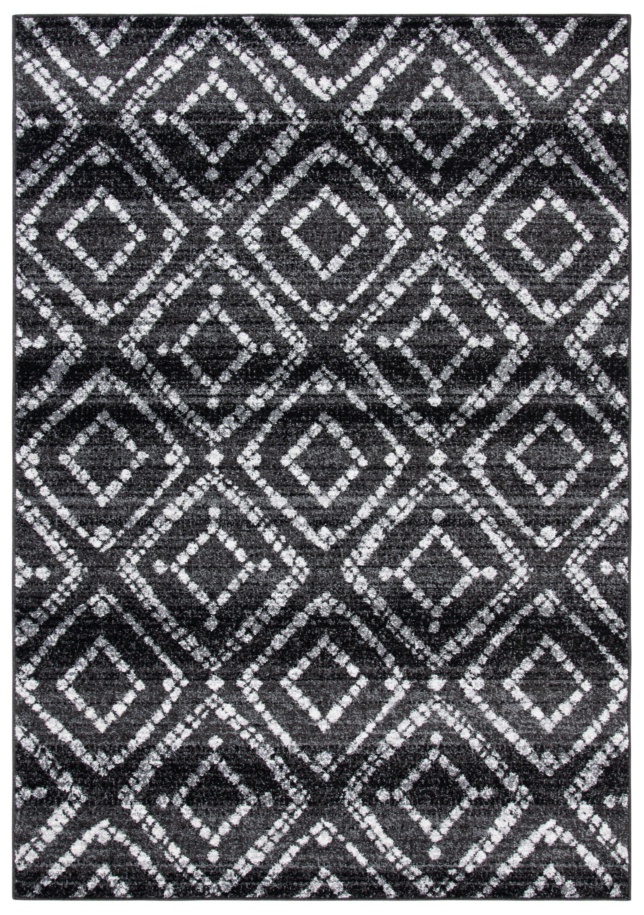 Black and Ivory Geometric Synthetic Rectangular Area Rug