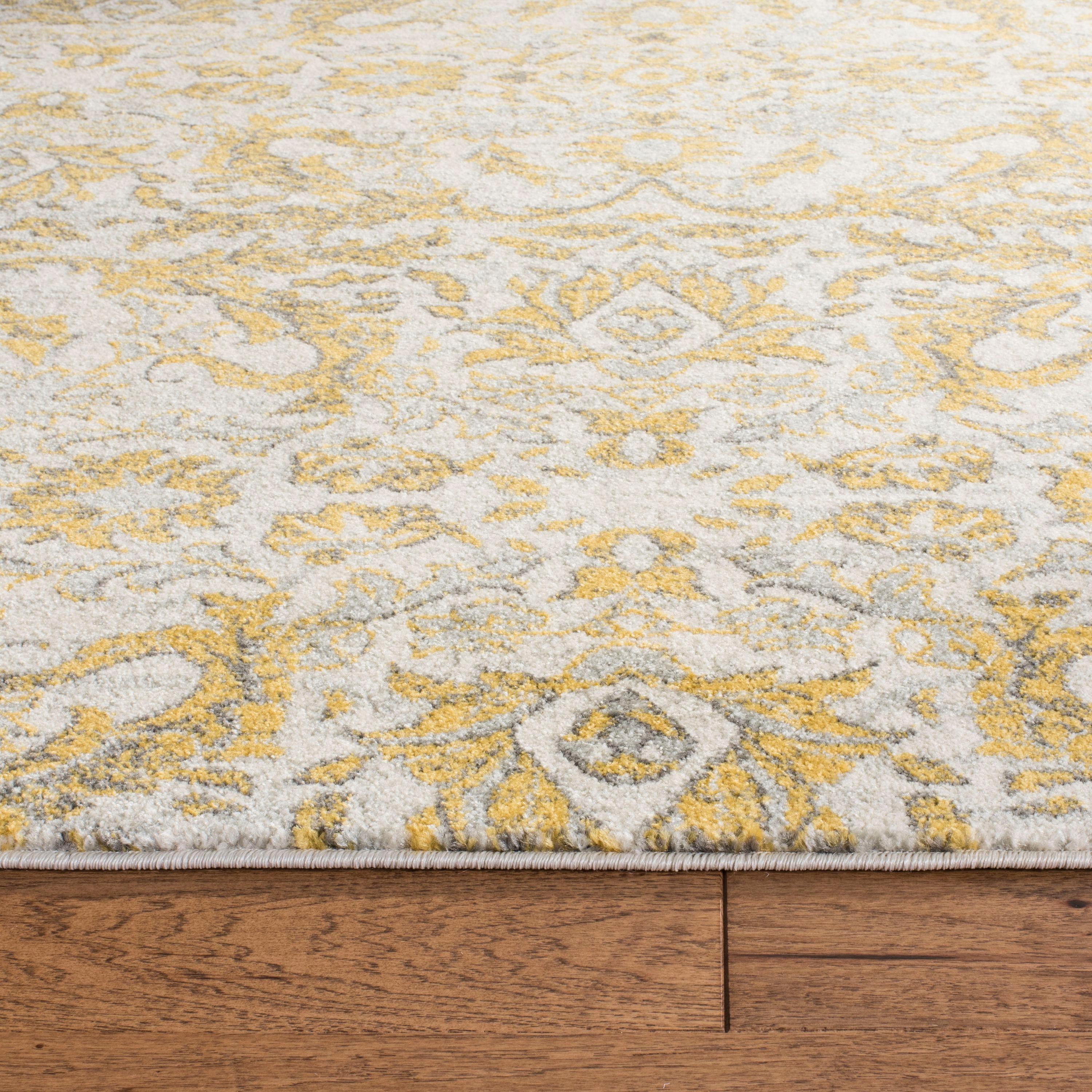 Evoke EVK238 Power Loomed Area Rug - Ivory/Gold - 6'7"x9' - Safavieh.