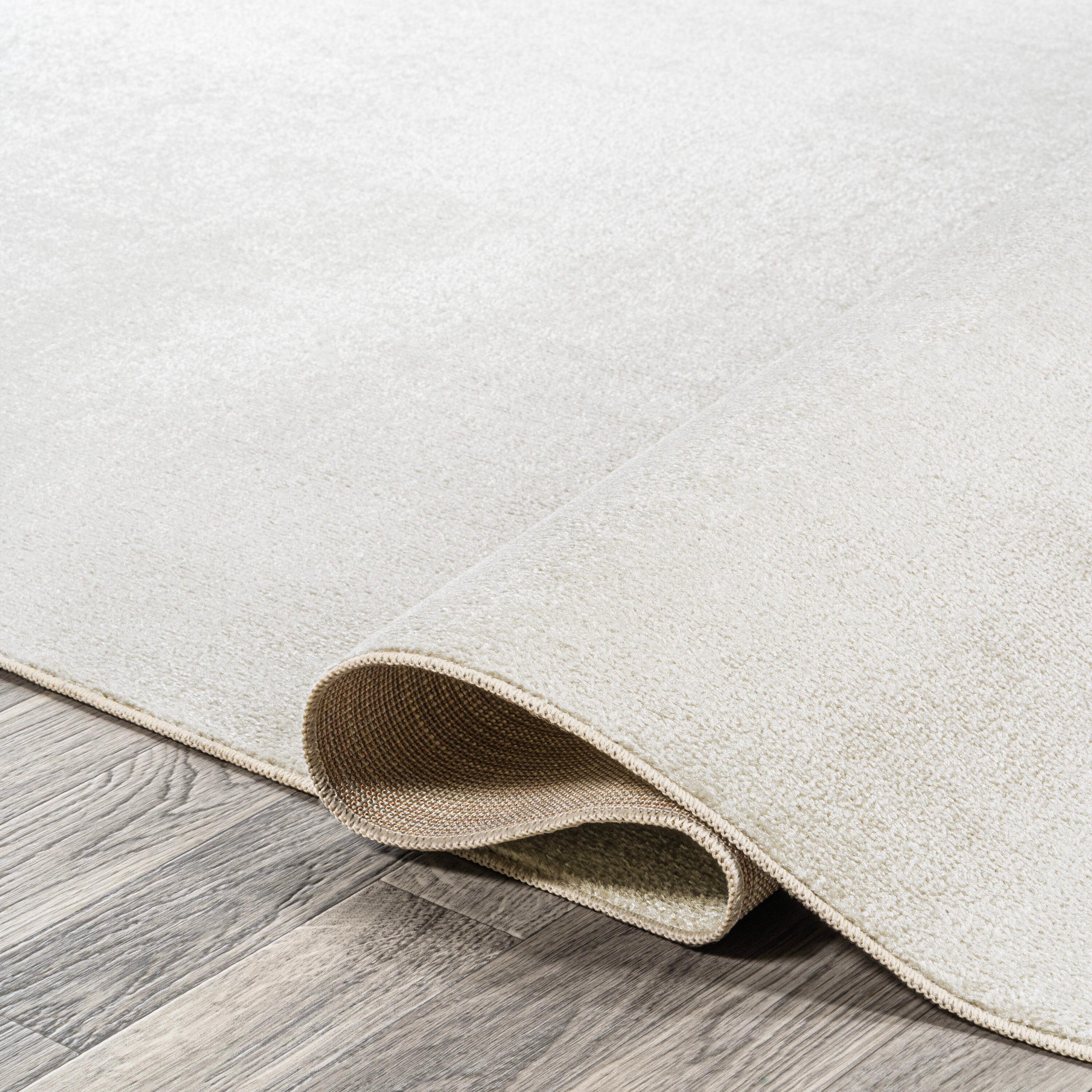 JONATHAN Y Twyla Classic Solid Low-Pile Machine-Washable Cream 4 ft. x 6 ft. Area Rug