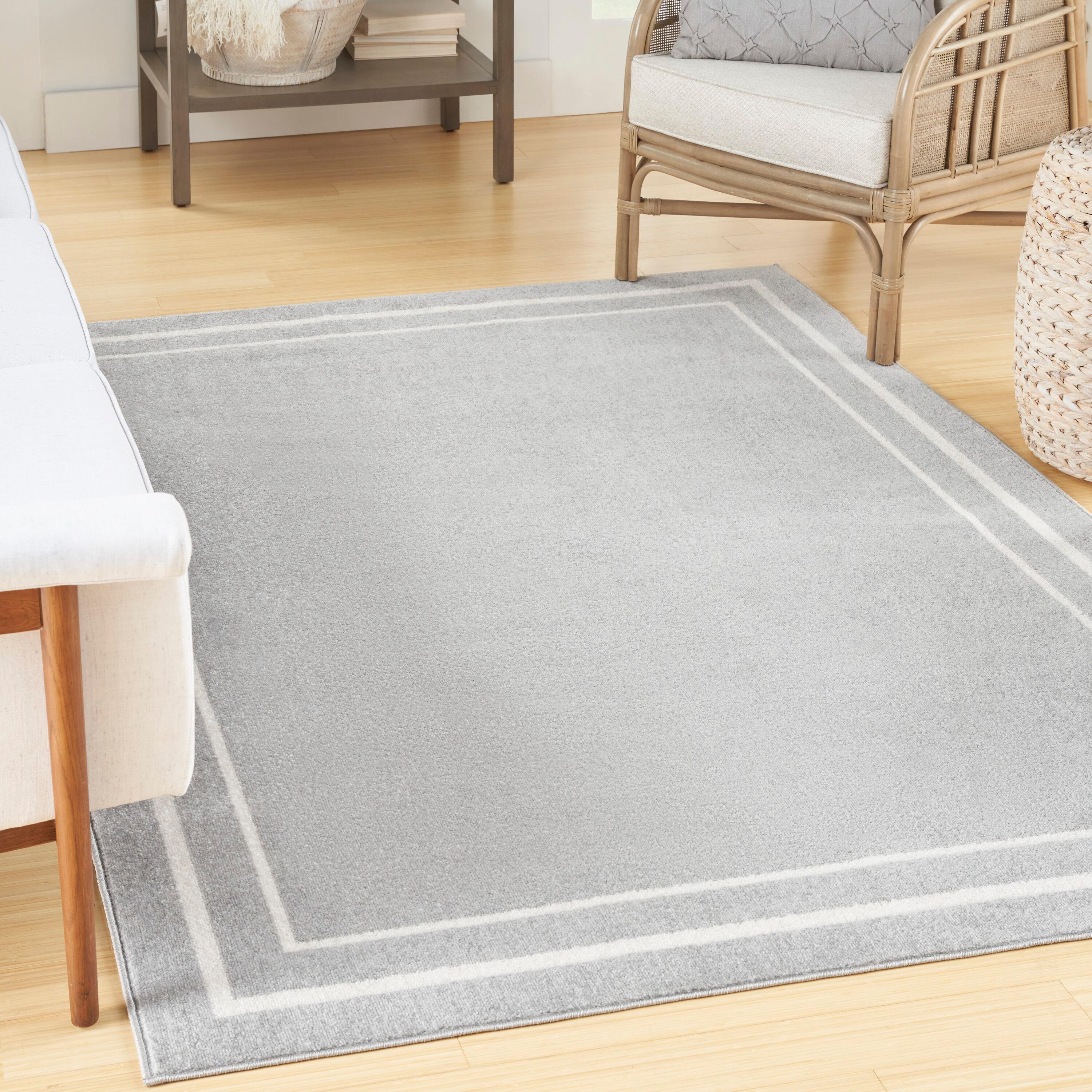 Nourison Essentials Solid Bordered Low Pile Indoor Outdoor Area Rug 5' x 7' Grey/Ivory