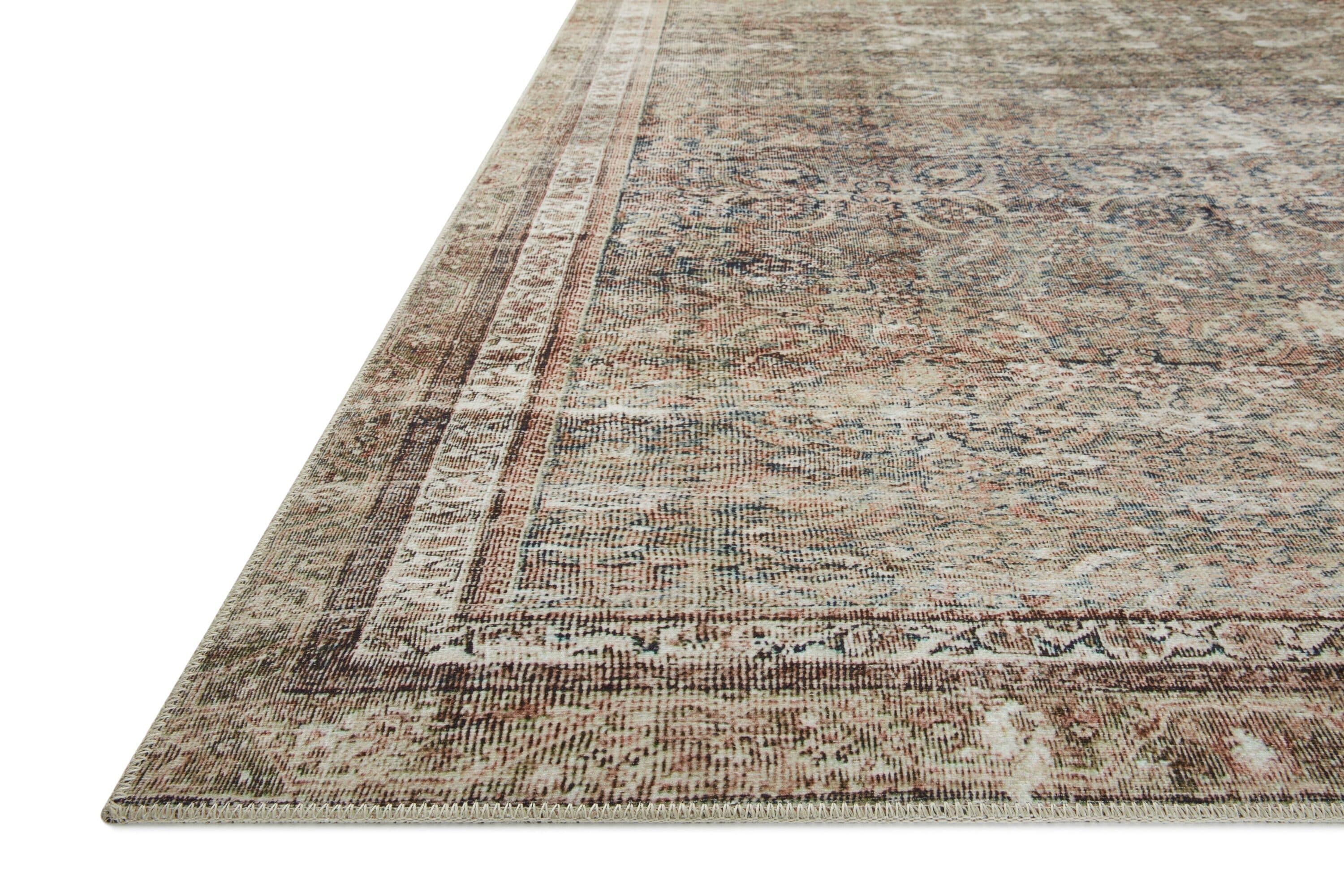 Jules Oriental Power Loomed Polyester Area Rug in Ink / Terracotta