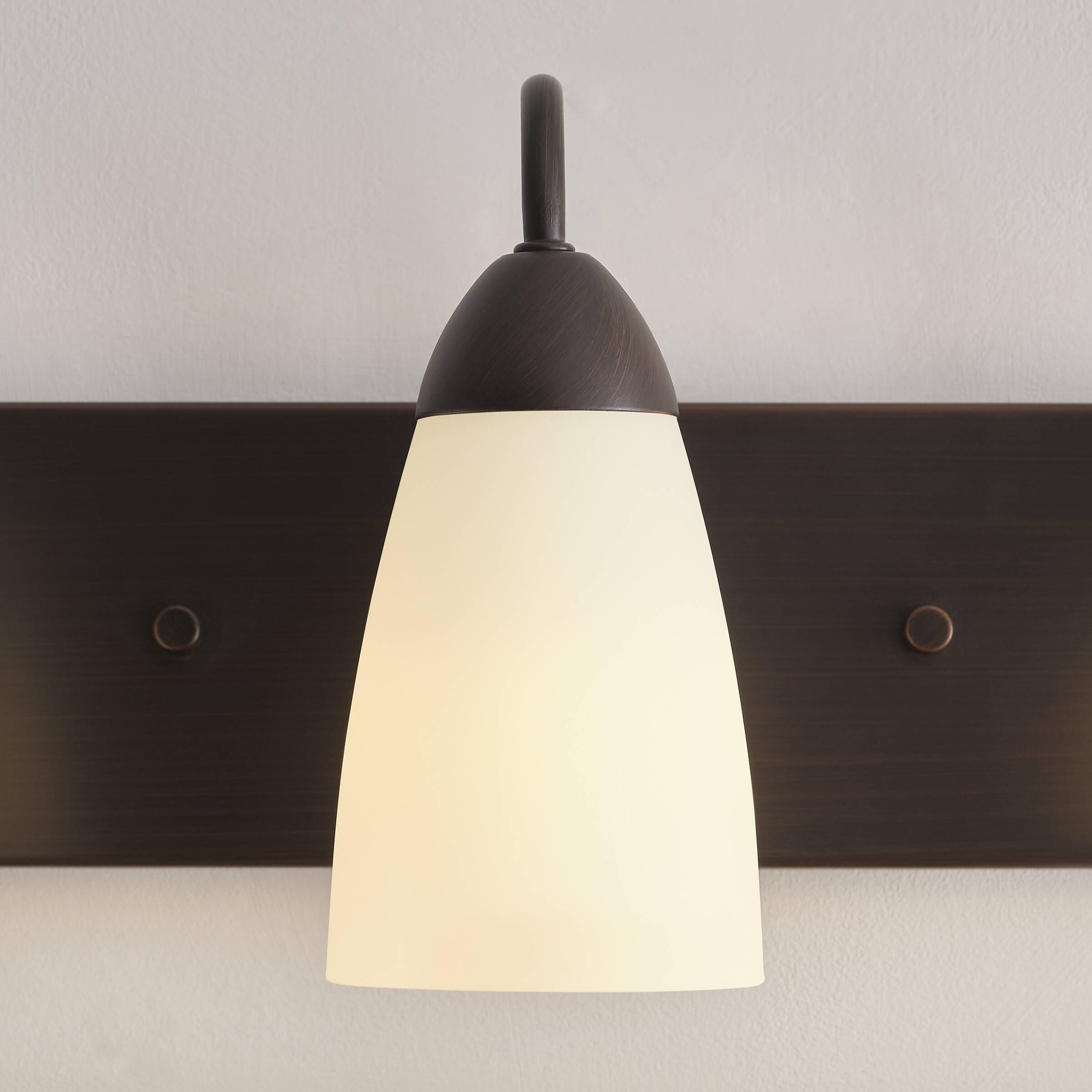 Generation Lighting 4420203-710 Seville Three - Light Wall/Bath Vanity Style Fixture, Bronze