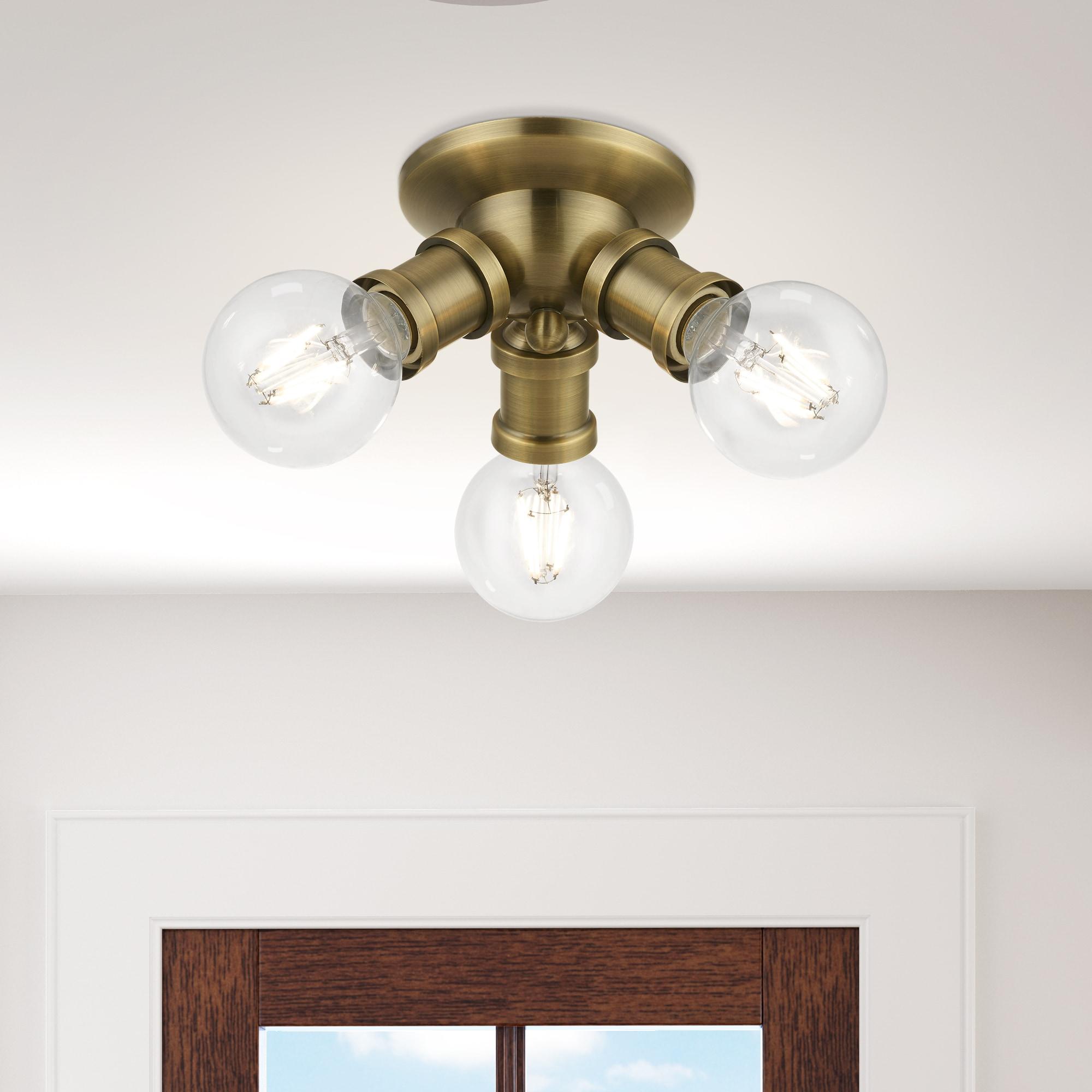 Livex Lighting Lansdale 3 - Light Flush Mount in  Antique Brass