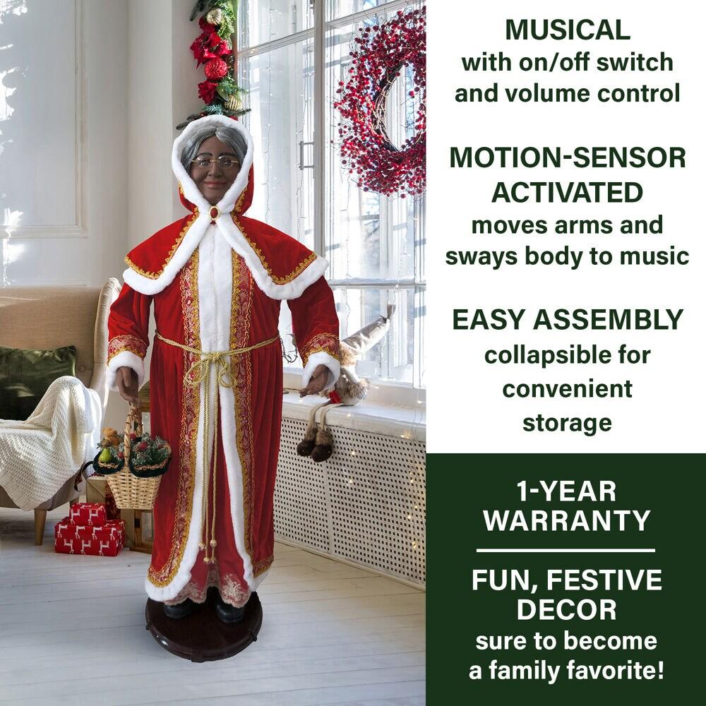 African American Dancing Mrs. Claus with Hooded Cloak and Basket Figurine