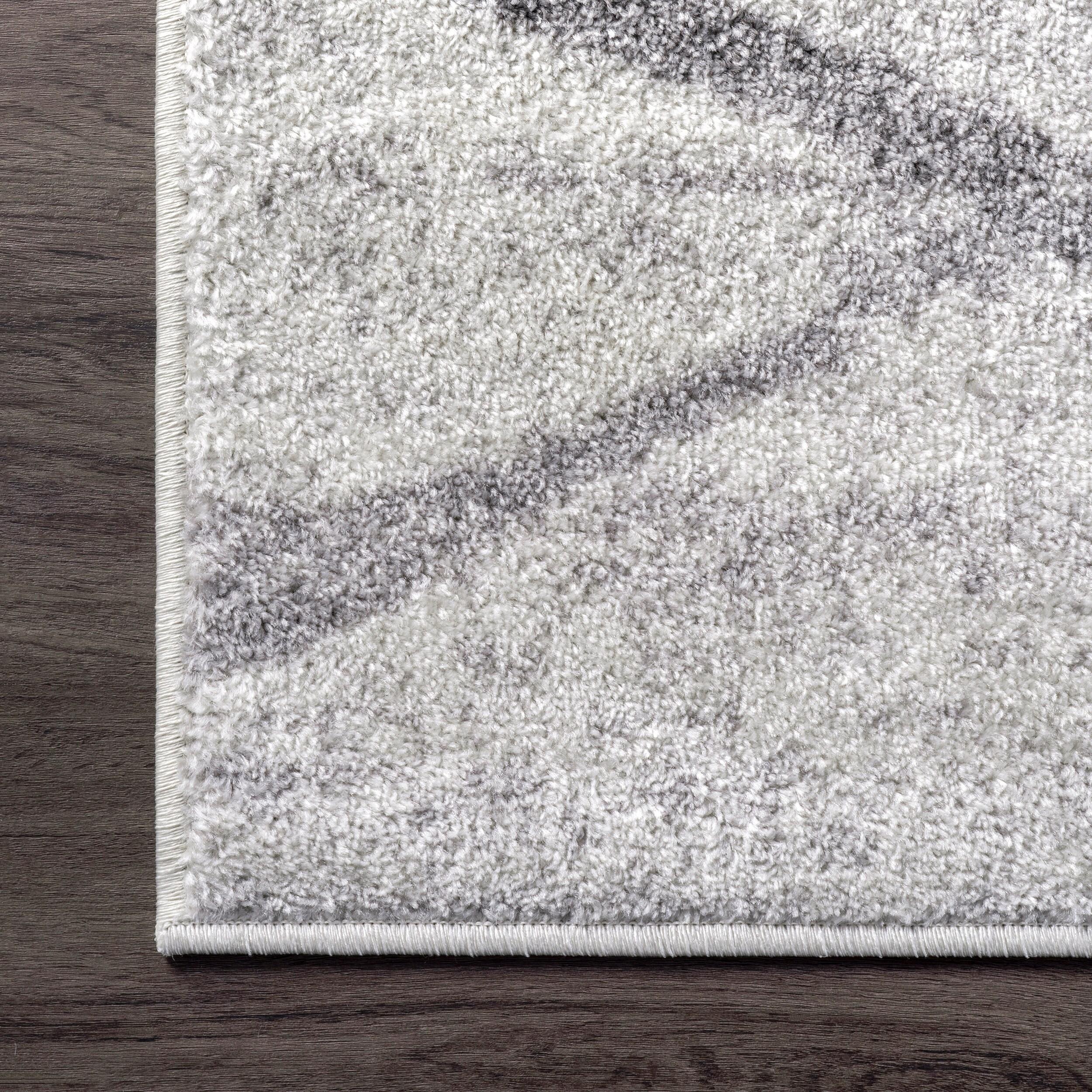 Gray Oval Reversible Stain-Resistant Synthetic Area Rug