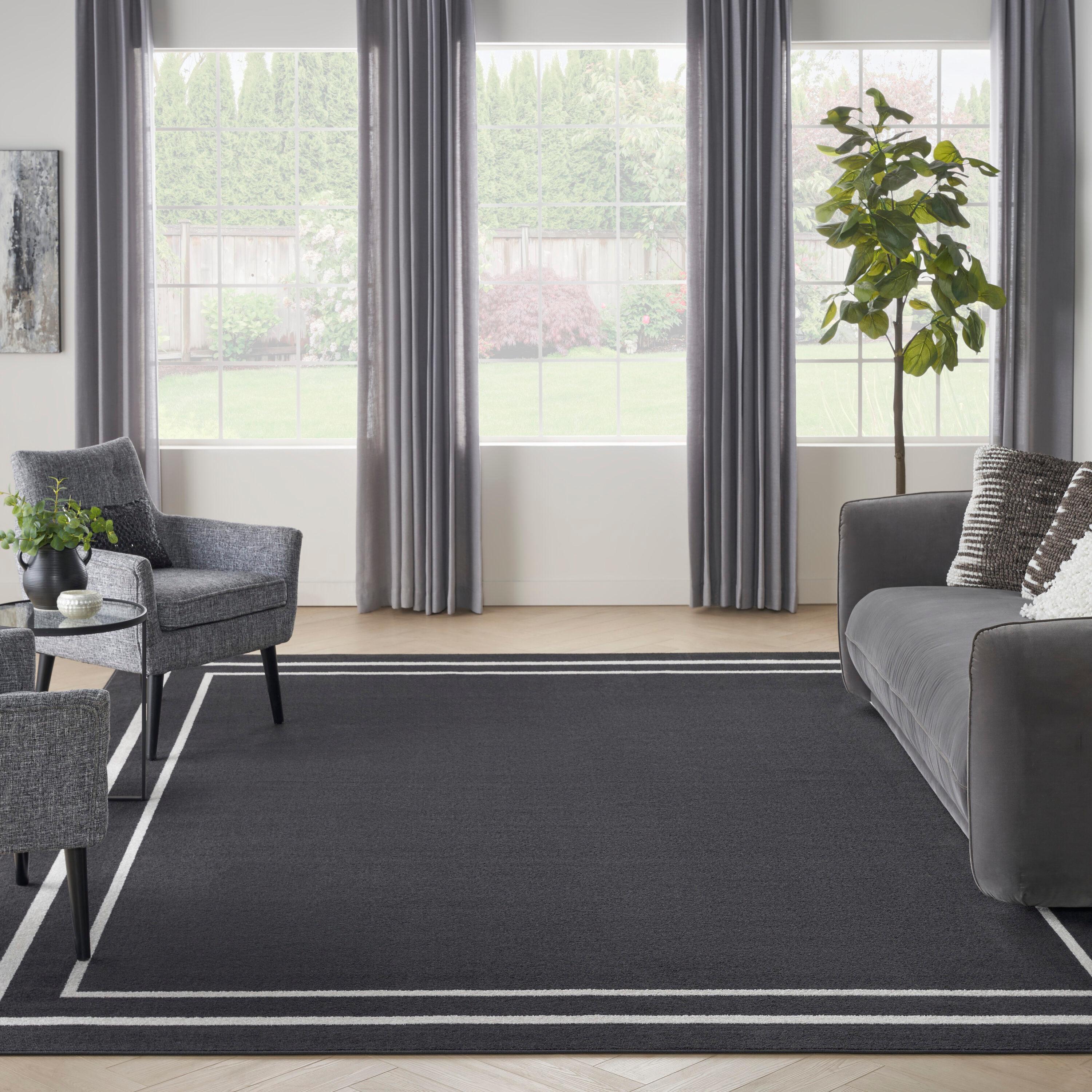 Nourison Essentials 9' x 12' Black Ivory Contemporary Indoor/Outdoor Rug