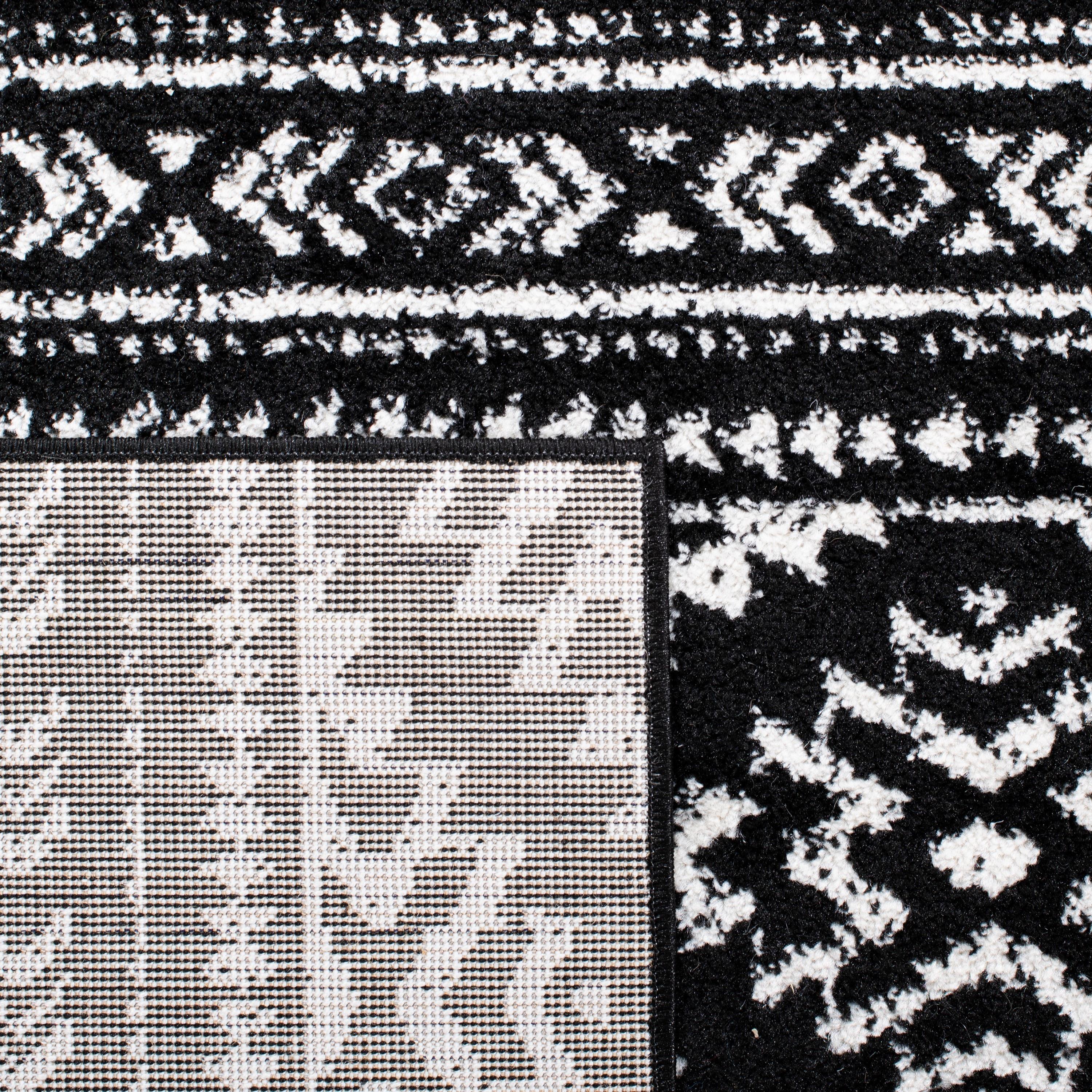 SAFAVIEH Tulum Lakisha Distressed Southwestern Area Rug, 10' x 13', Black/Ivory