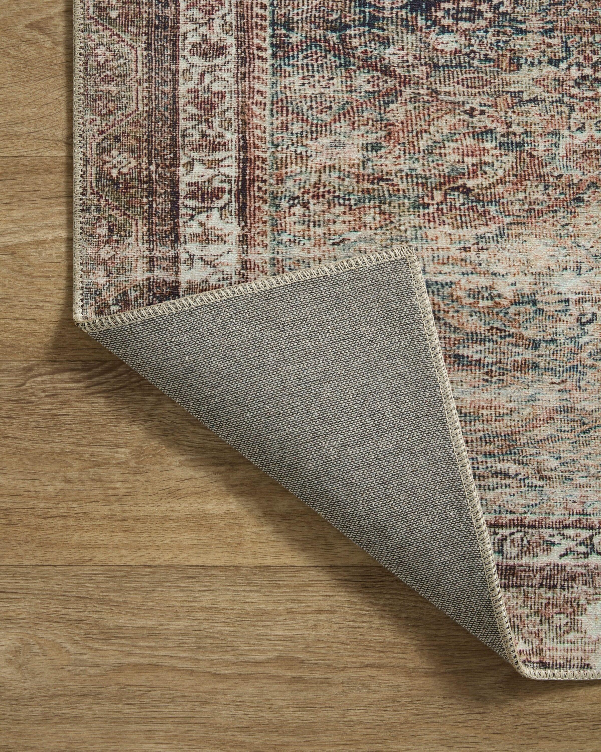 Jules Oriental Power Loomed Polyester Area Rug in Ink / Terracotta