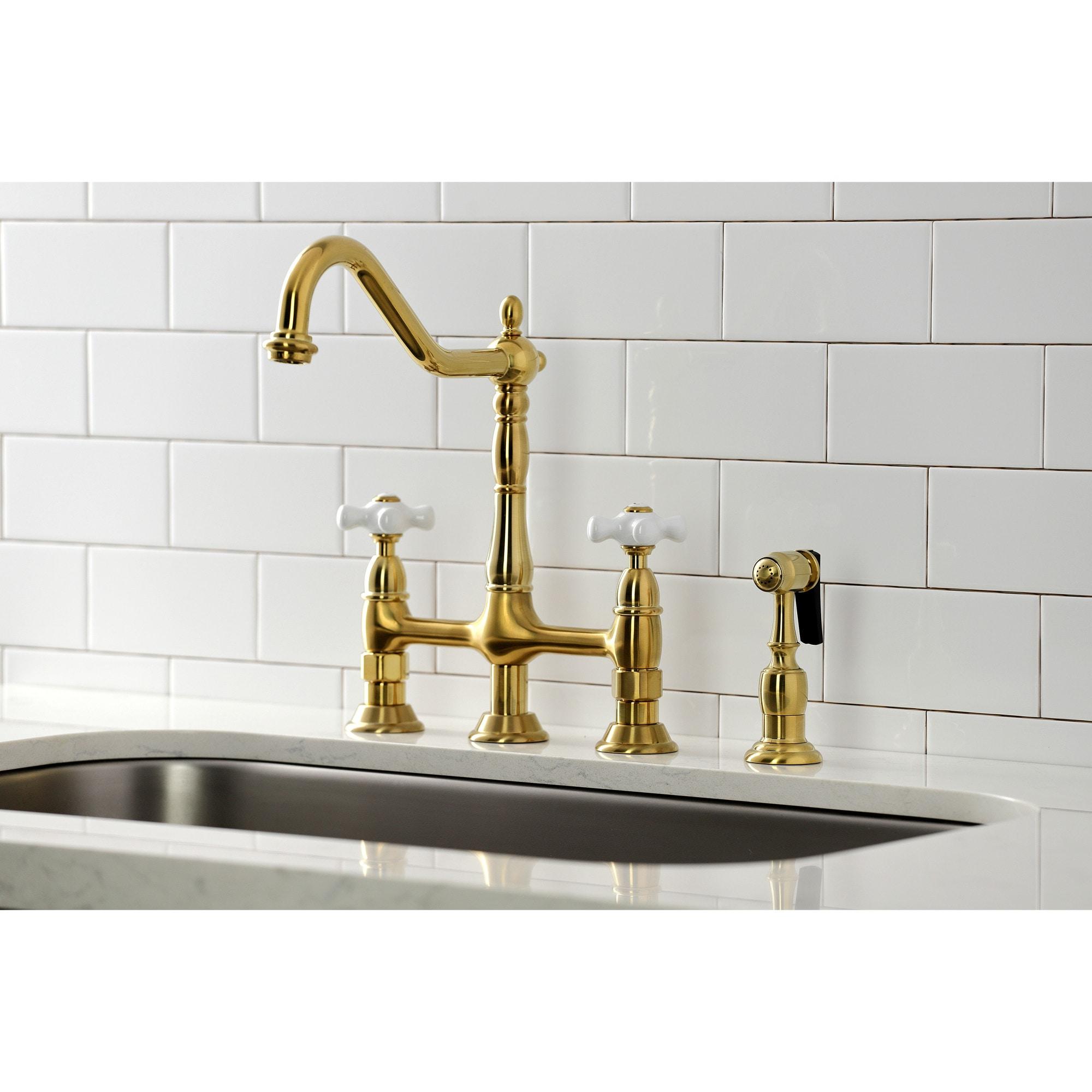 Kingston Brass Heritage Two-Handle 4-Hole Deck Mount Bridge Kitchen Faucet with Brass Side Sprayer