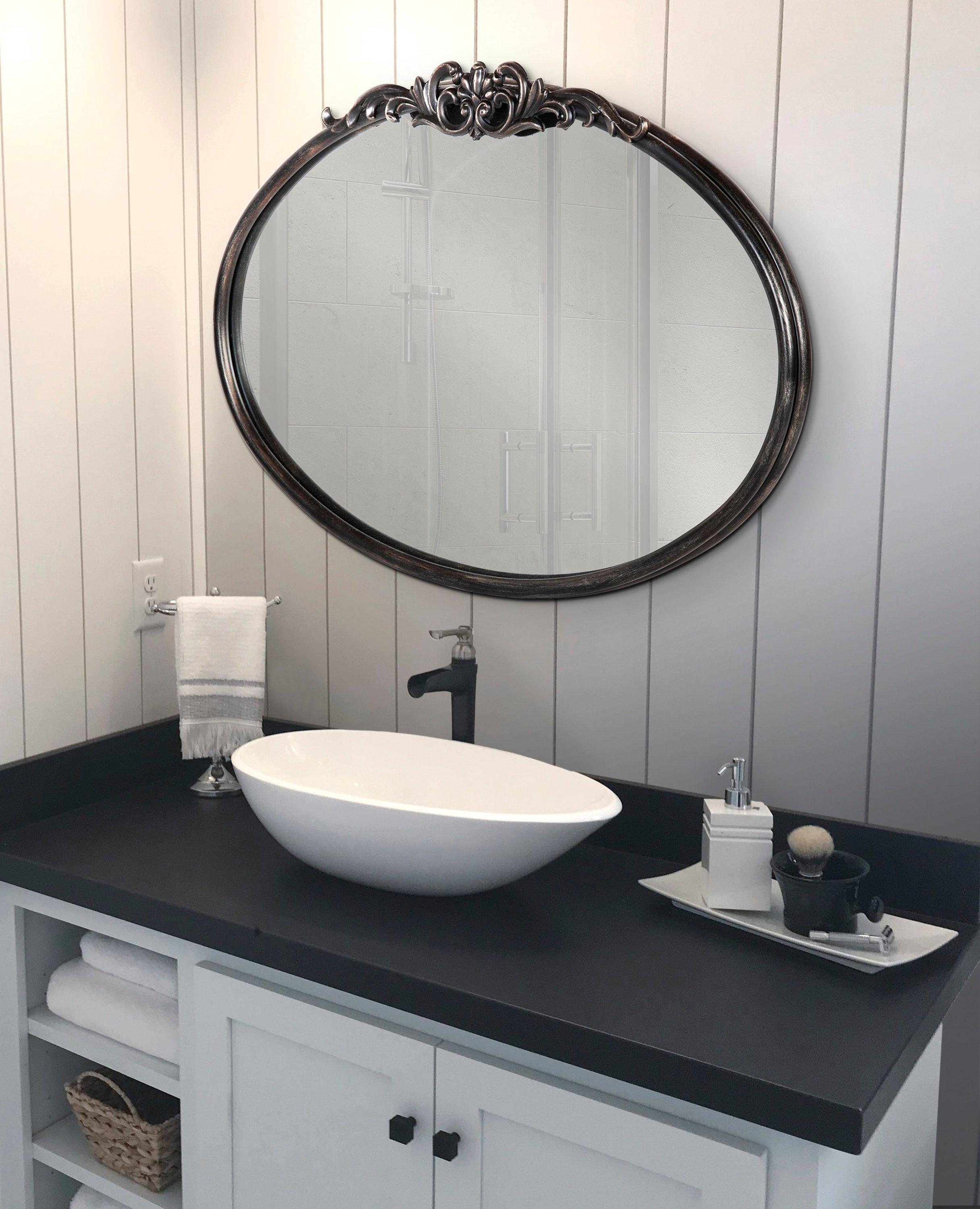Black Oval Wood Wall Mirror with Intricate Overlay