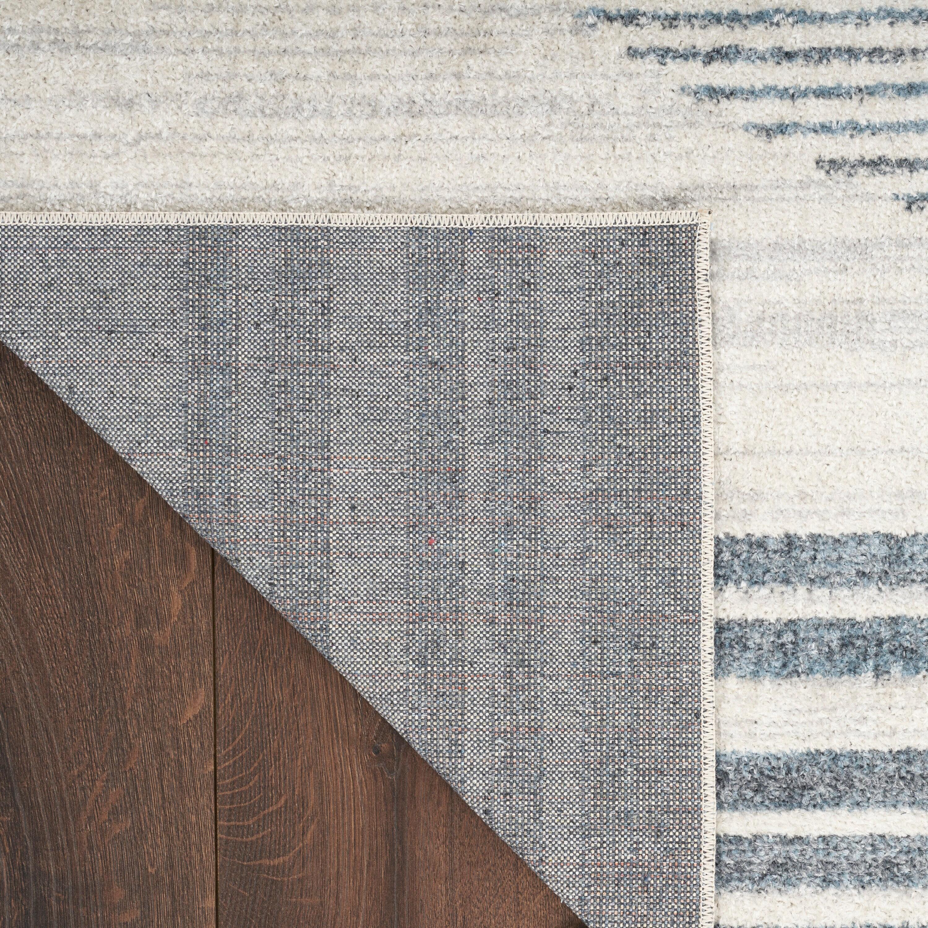Nourison Astra Machine Washable Stripe Circle Mid-Century Modern Indoor Rug Ivory Blue 5'3" x 7'