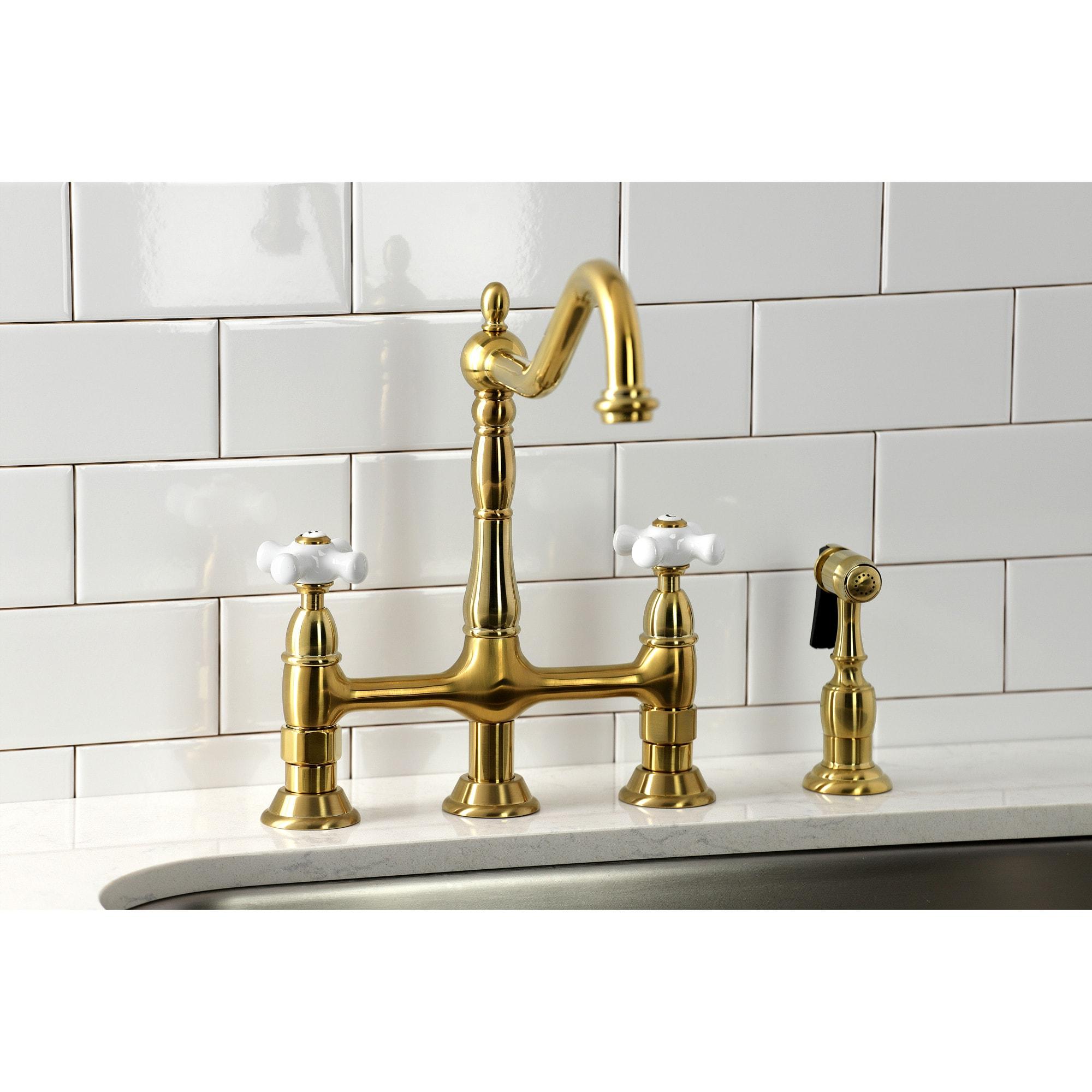 Kingston Brass Heritage Two-Handle 4-Hole Deck Mount Bridge Kitchen Faucet with Brass Side Sprayer