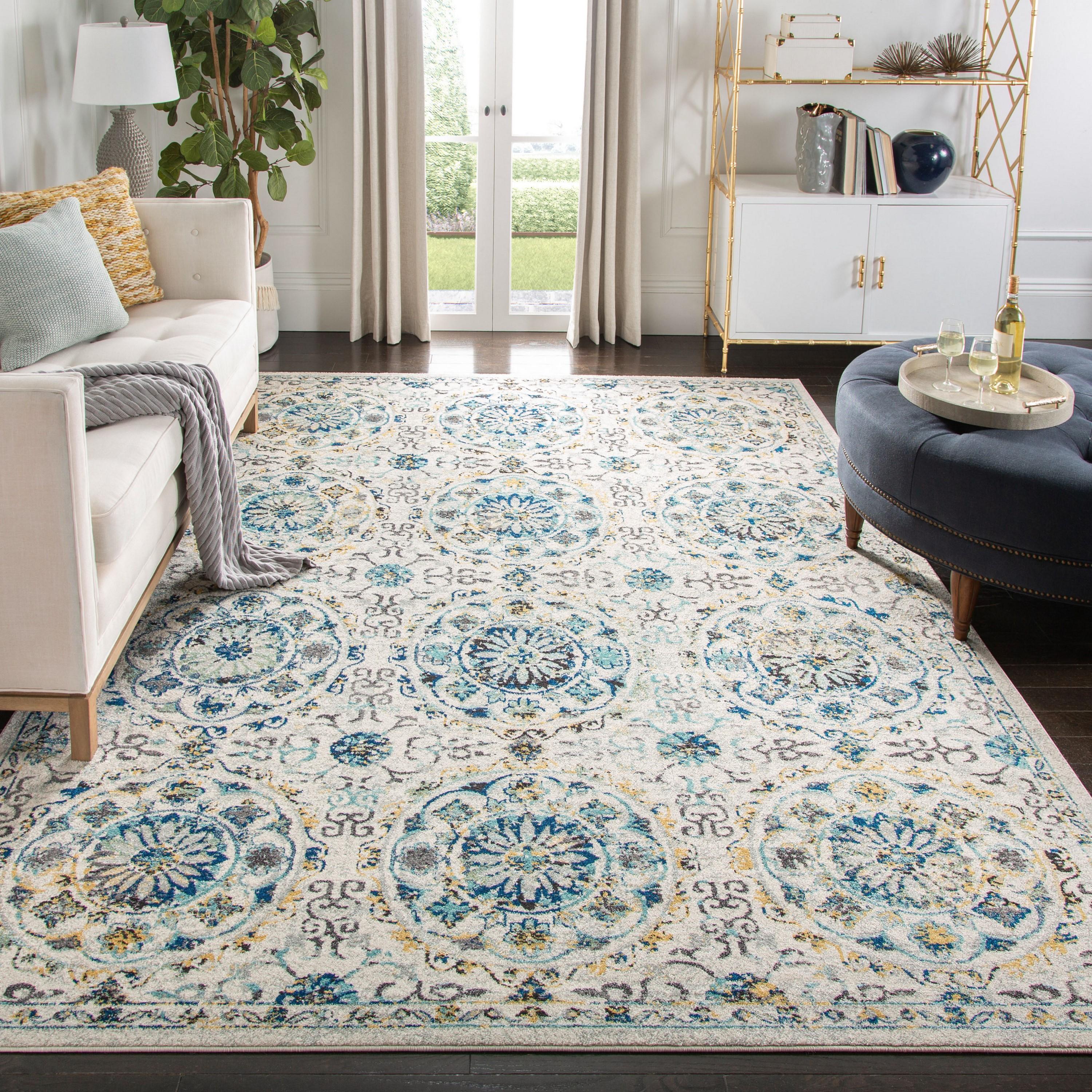 Ivory and Blue Floral Motif Synthetic Area Rug