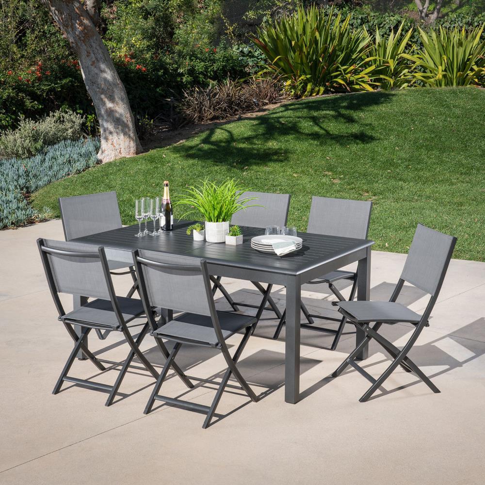 Hanover Cameron 7-Piece Expandable Dining Set with 6 Folding Sling Chairs and a 40" x 94" Table