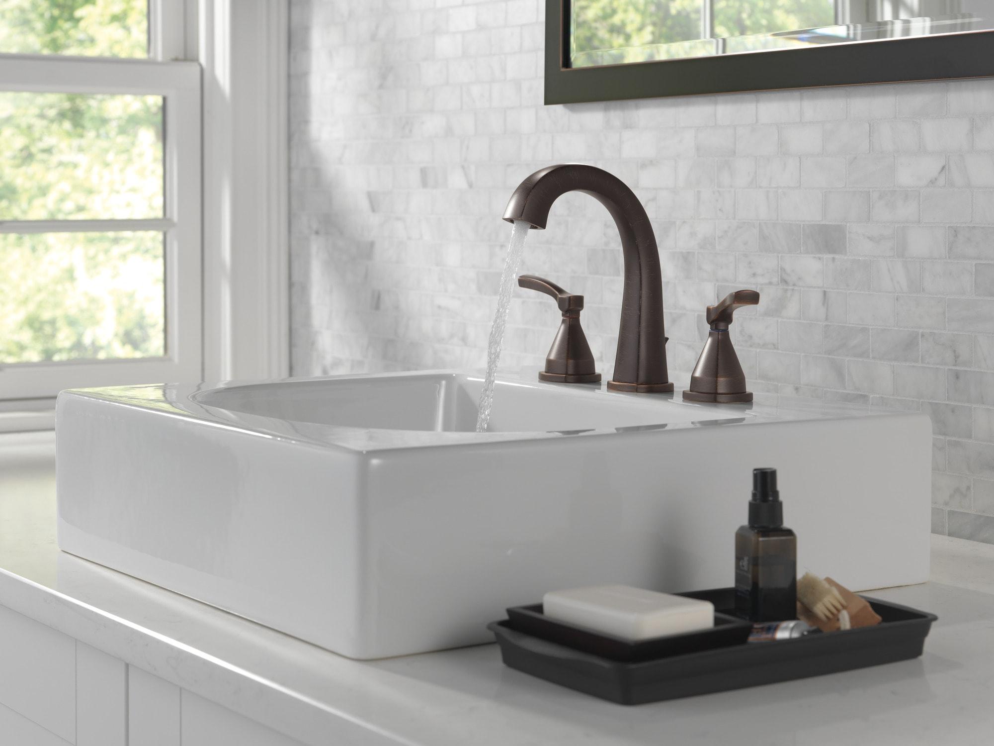 Stryke Widespread Bathroom Faucet with Drain Assembly and DIAMOND™ Seal Technology