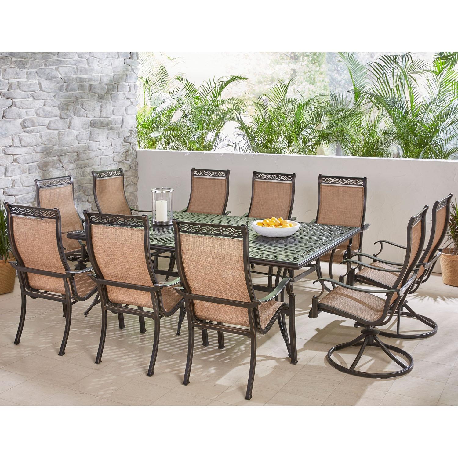 Hanover Manor 11-Piece Outdoor Dining Set in Cedar with 4 Contoured Swivel Rockers, 6 Contoured Chairs, and 60" x 84" Cast-Top Table